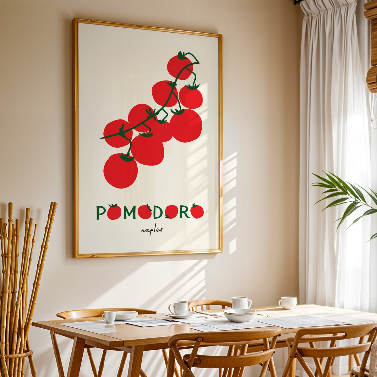 Pomodoro Naples tomato vine print in a gold frame above a sunlit breakfast table