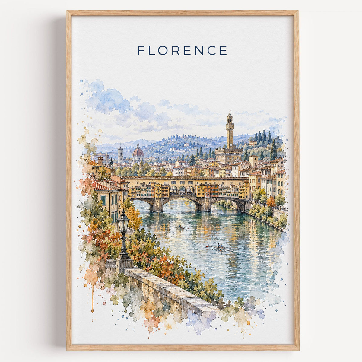 Ponte Vecchio watercolor print in a light oak frame on a plain white wall
