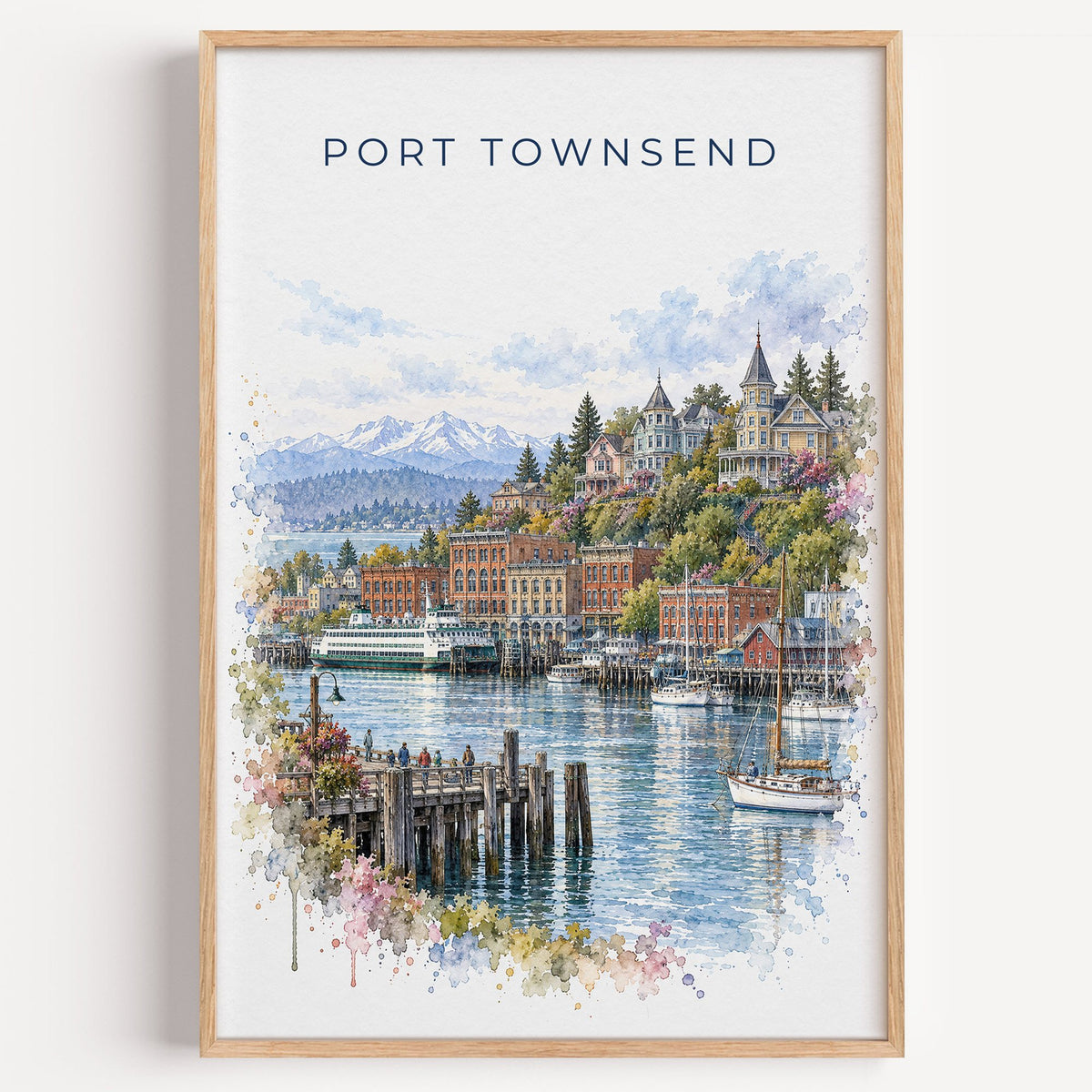 Port Townsend watercolor print in a light oak frame on a plain white wall