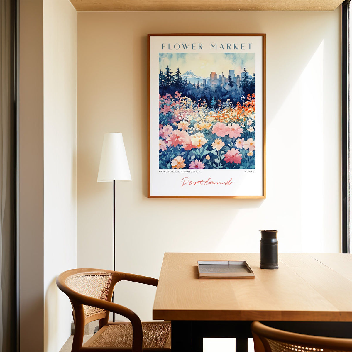 Portland flower market print in an oak frame above a dining table and cane chair