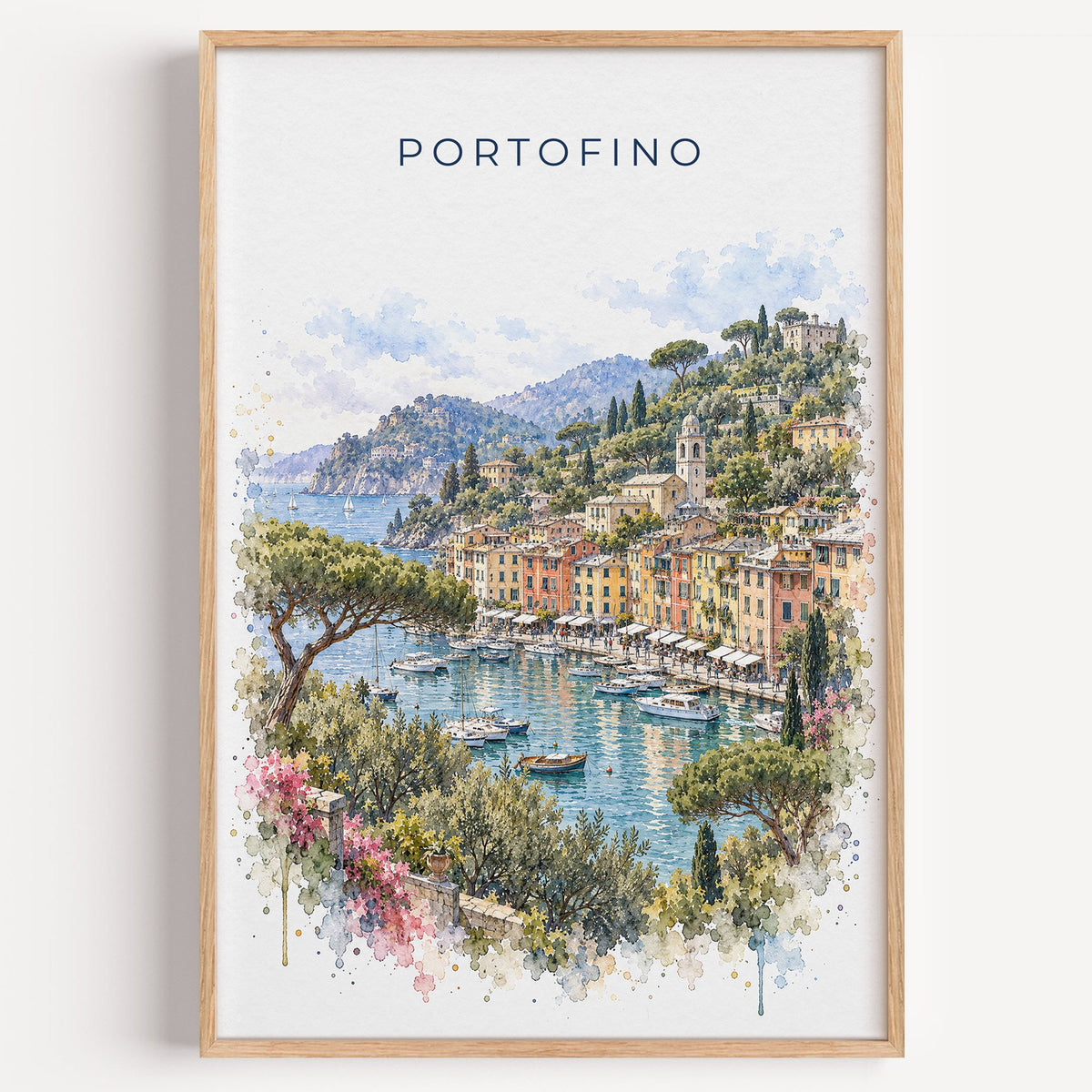 Portofino watercolor print in a light oak frame on a plain white wall