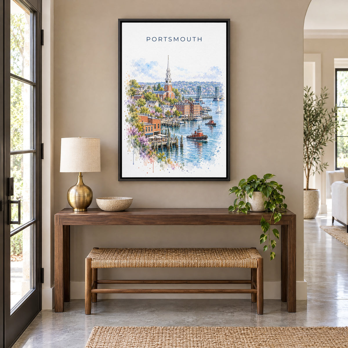 Portsmouth, New Hampshire watercolor print as a black floater canvas above a walnut console and woven bench in an entryway