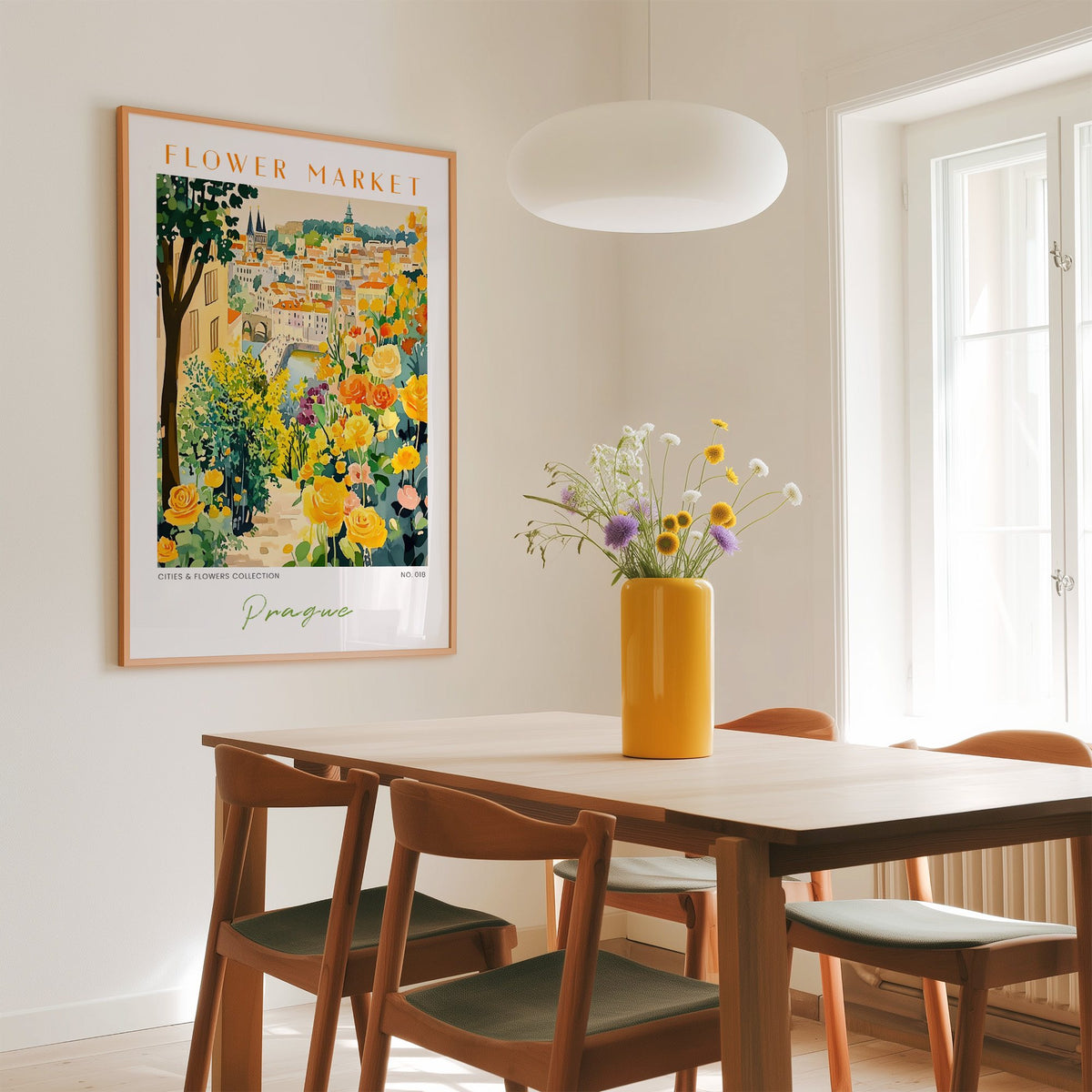 Prague flower market print in an oak frame above a dining table with a yellow vase and white pendant light