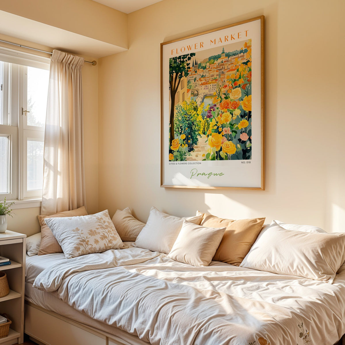 Prague flower market print in an oak frame above a cream daybed in a sunny bedroom