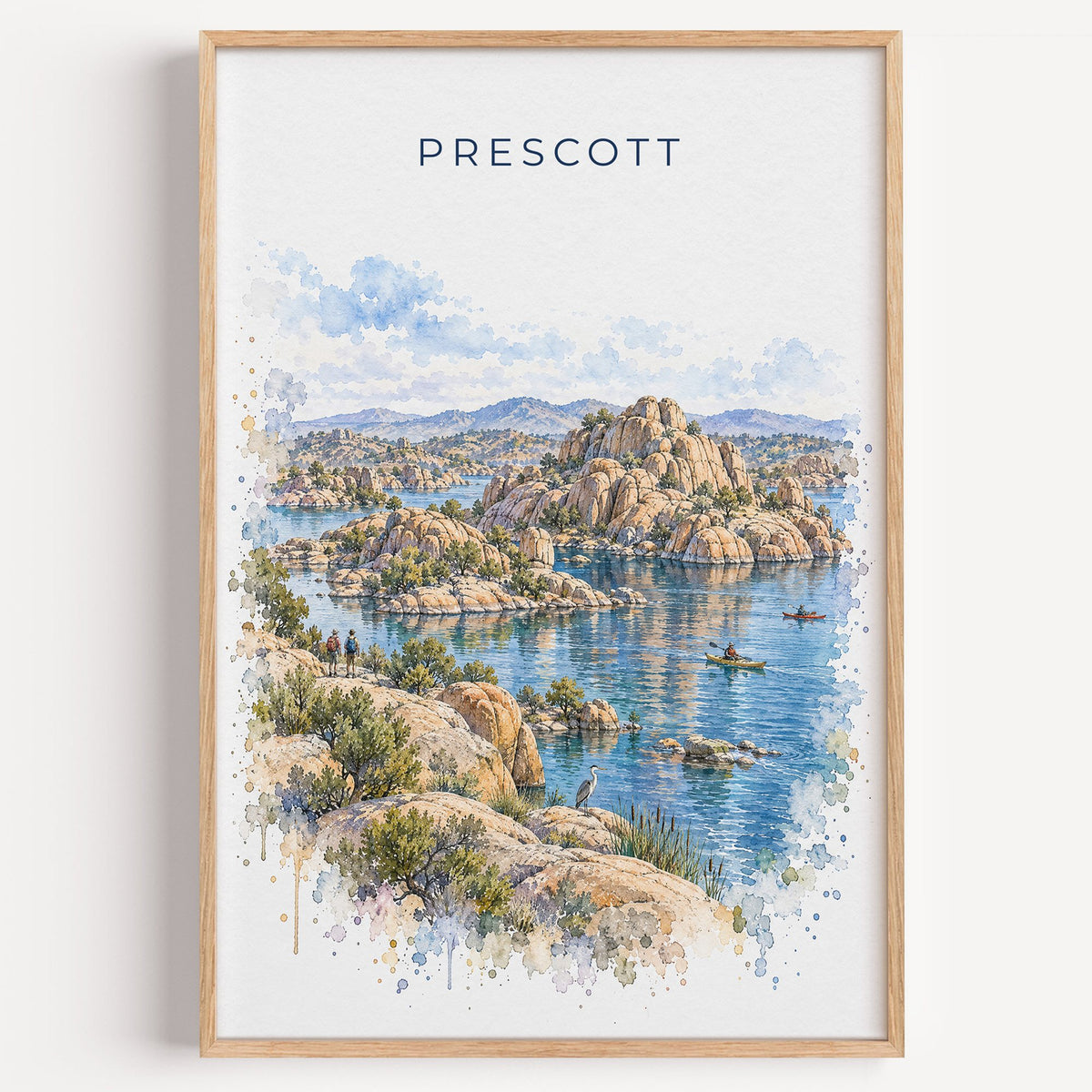 Prescott watercolor print in a light oak frame on a plain white wall