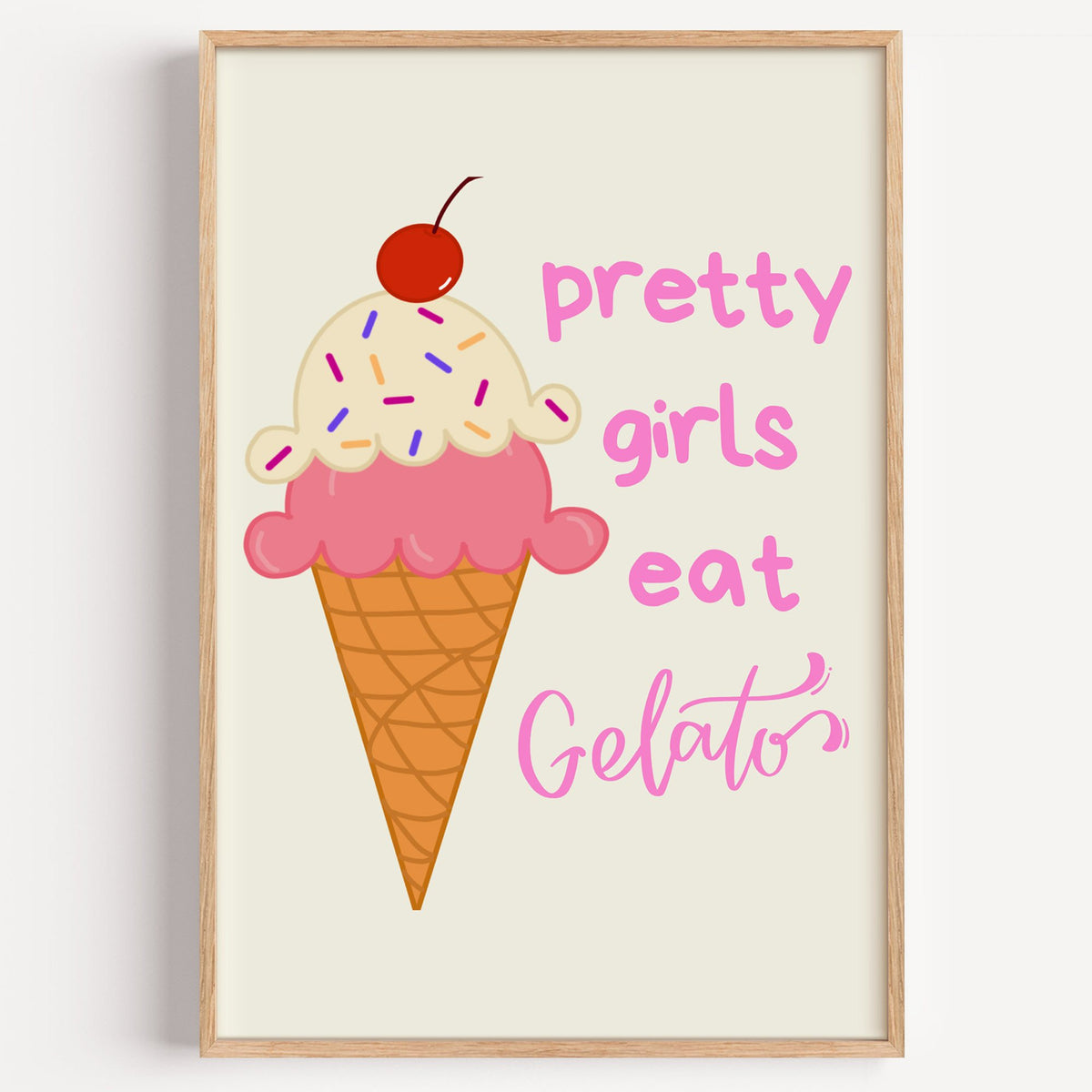 Pretty girls eat Gelato cone print in a light oak frame on a plain white wall