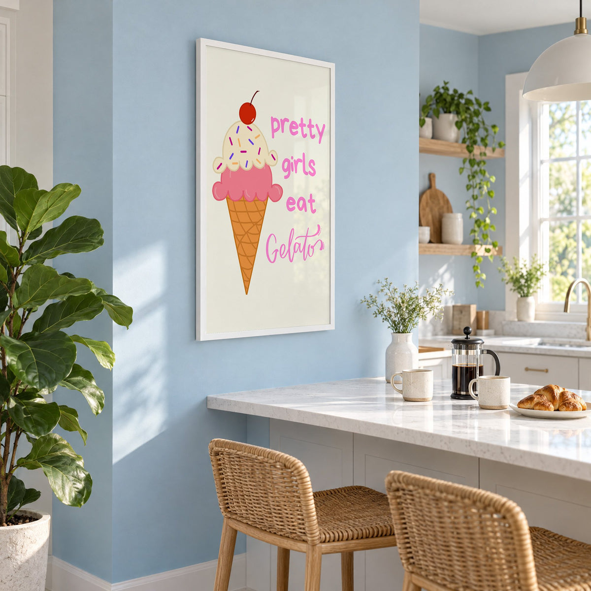 Pretty girls eat Gelato cone print in a white frame on a pale blue wall above a breakfast bar with rattan stools