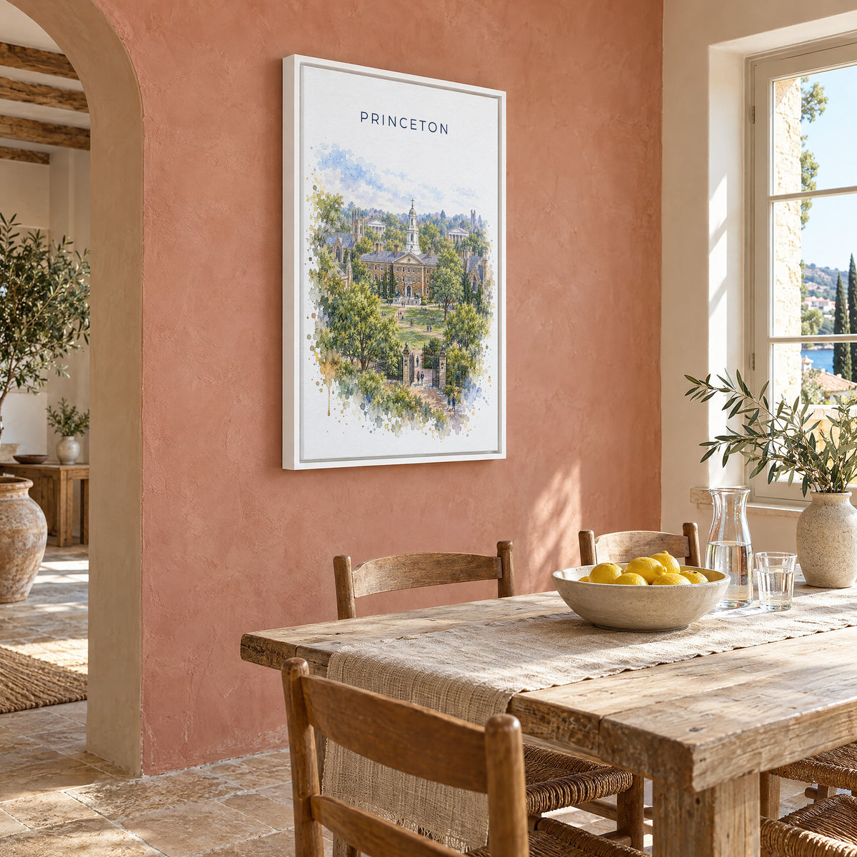 Princeton watercolor print as a white floater canvas on a terracotta wall above a rustic dining table