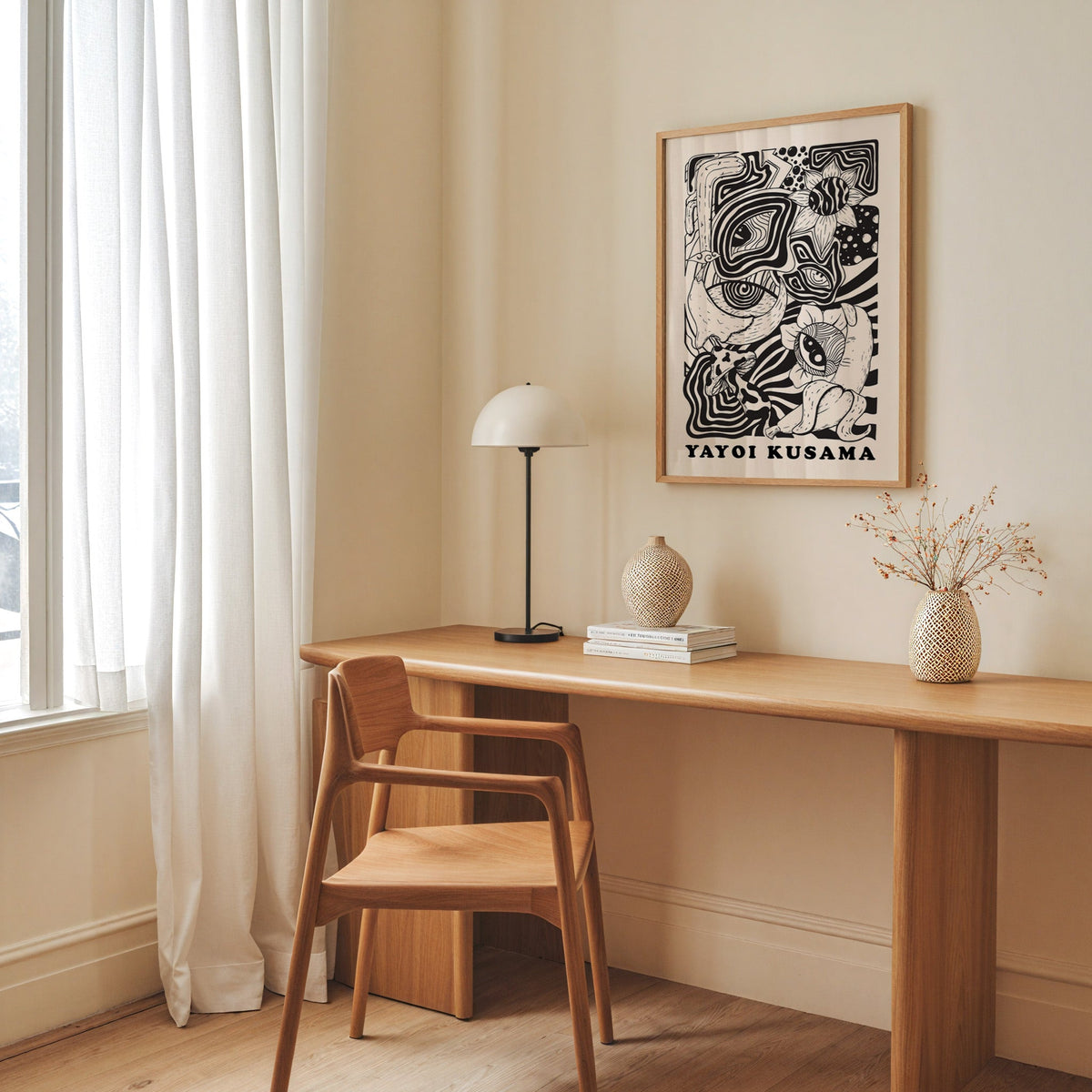 Yayoi Kusama inspired psychedelic eyes and mushroom print in an oak frame above an oak desk with a dome lamp