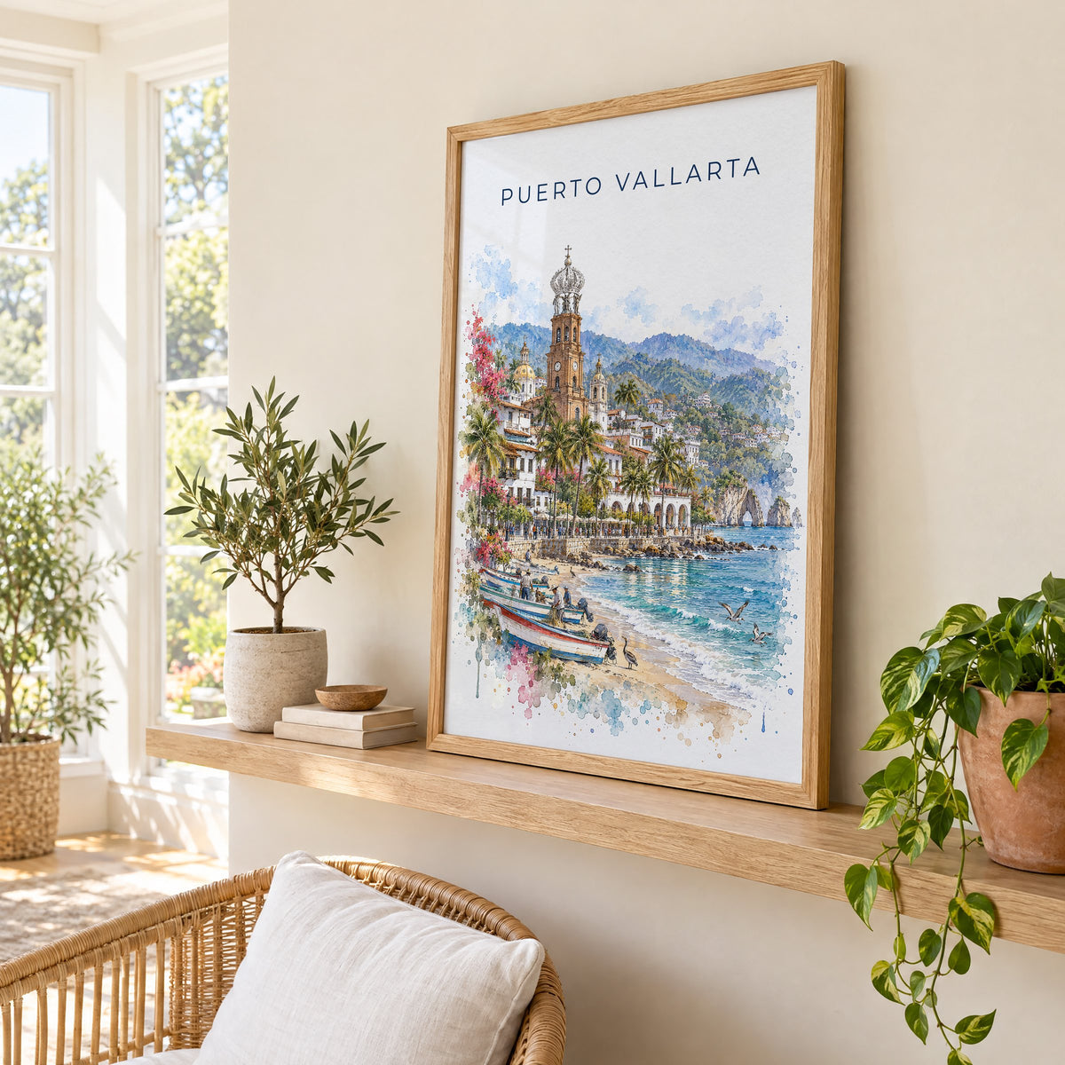 Puerto Vallarta watercolor print in an oak frame on a picture ledge in a sunlit sunroom