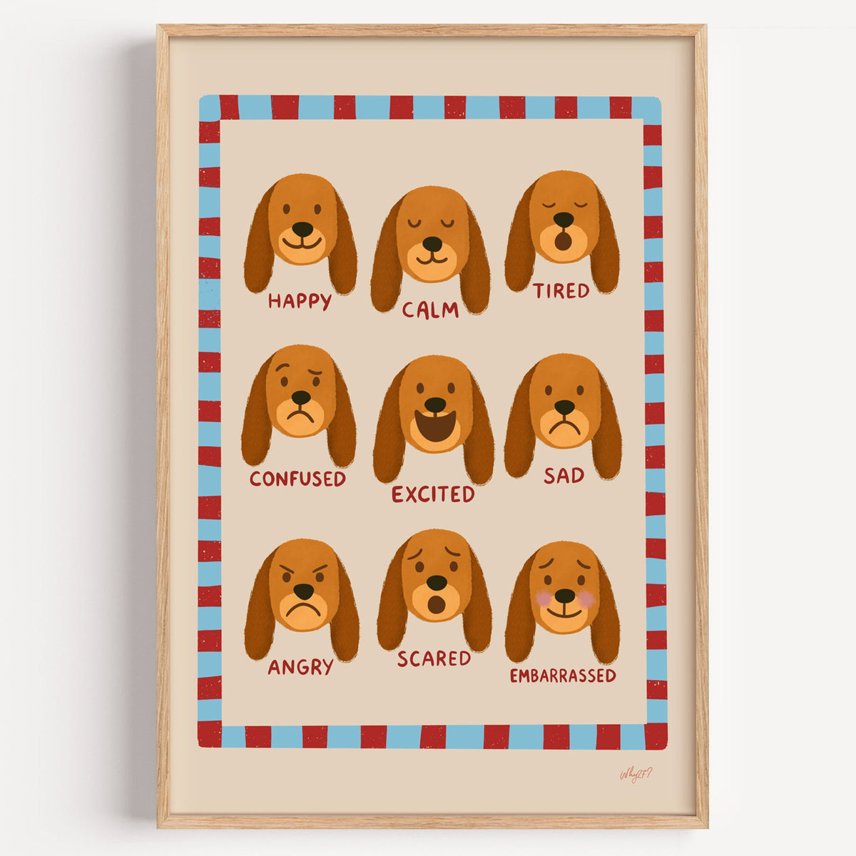 Puppy feelings chart nursery print in a light oak frame on a plain white wall