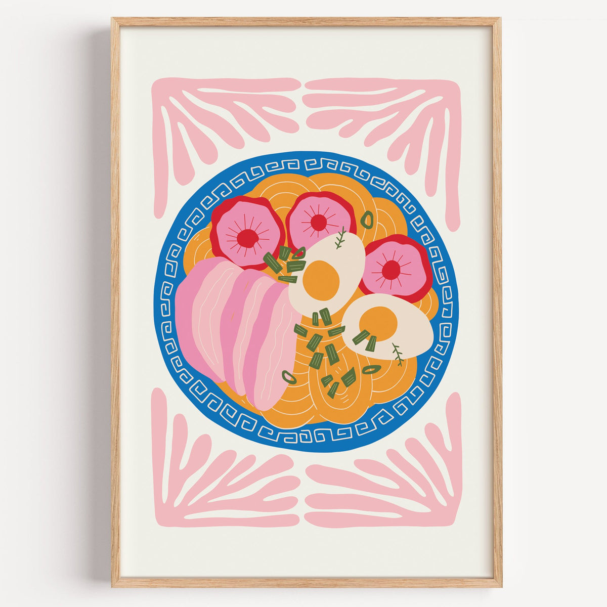 ramen bowl top view pink leaf frame print in a light oak frame on a plain white wall