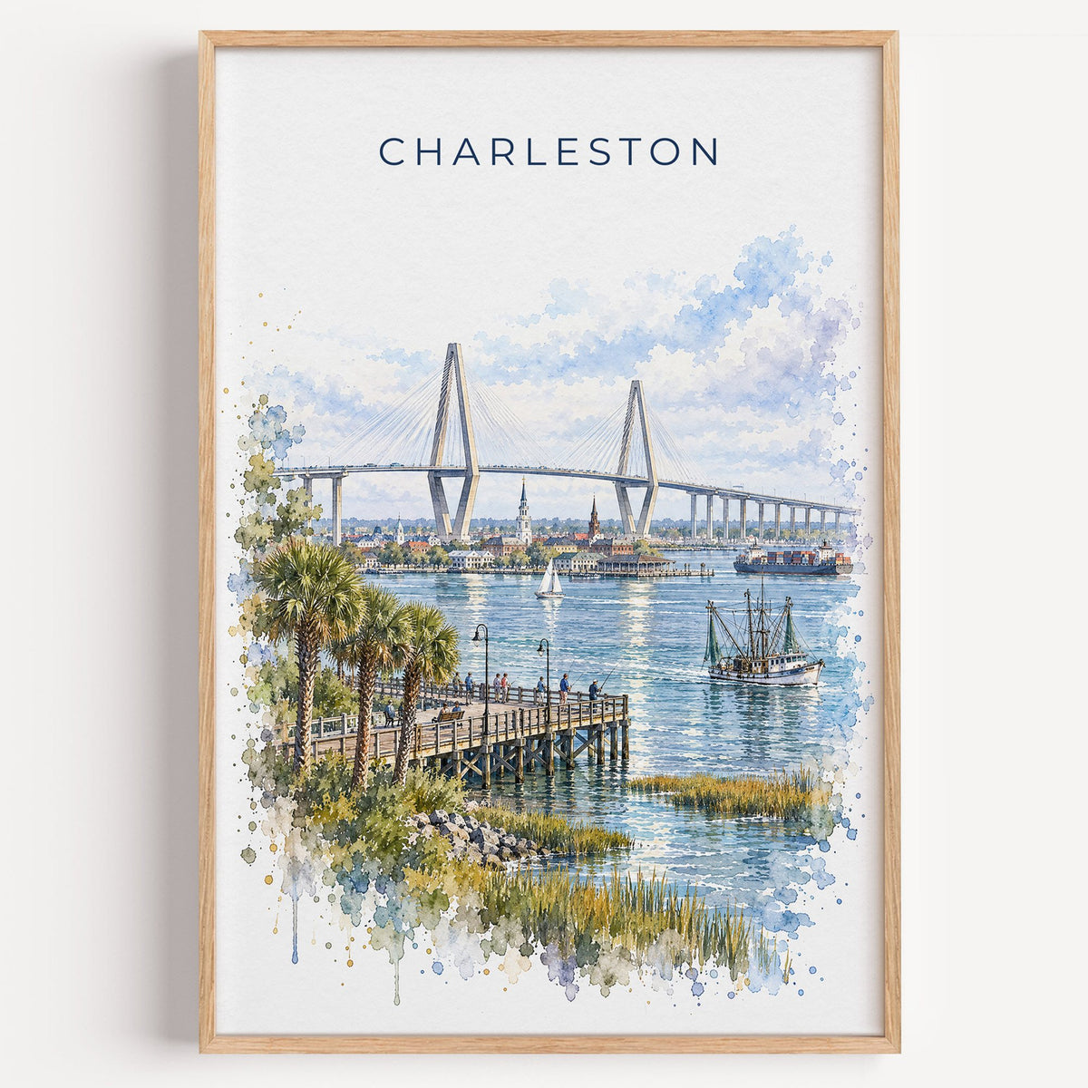 Ravenel Bridge Charleston watercolor print in a light oak frame on a plain white wall
