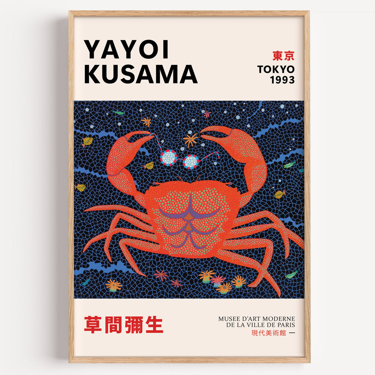 Yayoi Kusama inspired red dotted crab print in a wood frame on a plain wall