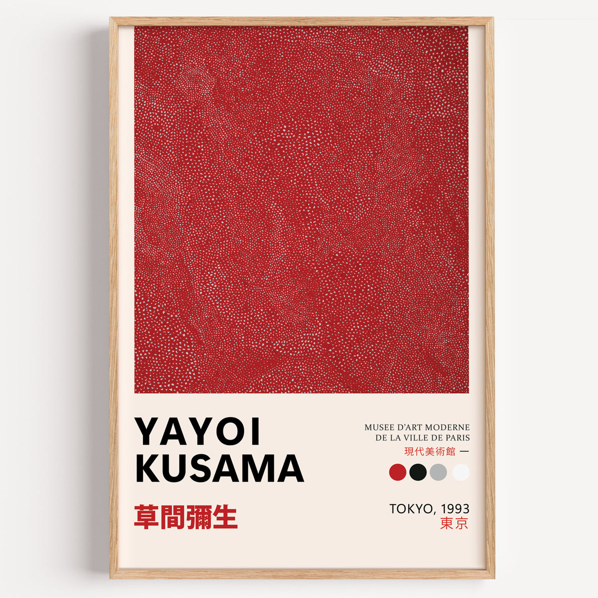 Yayoi Kusama inspired red dotted texture print in a wood frame on a plain wall