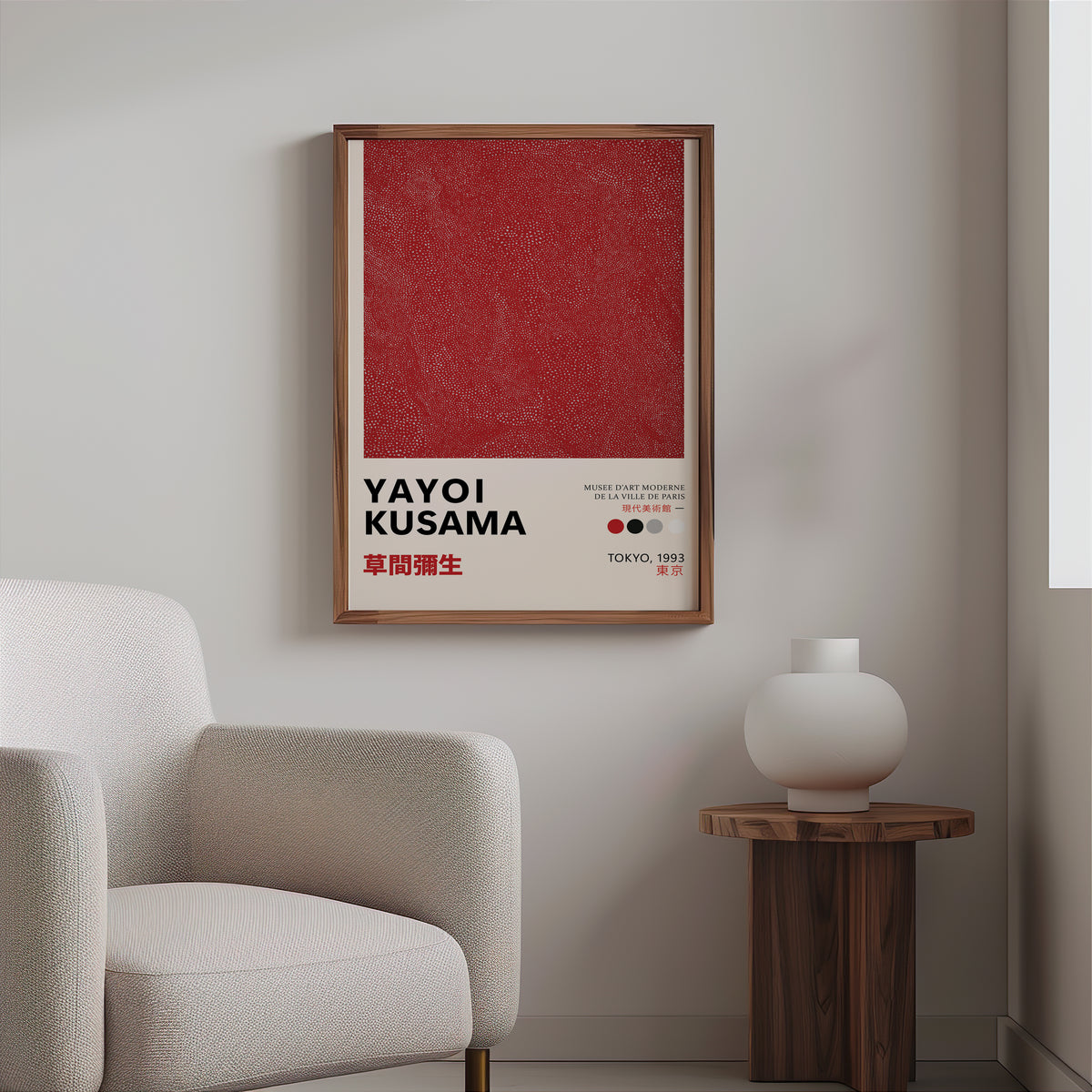Yayoi Kusama inspired red dotted texture print above a cream boucle armchair