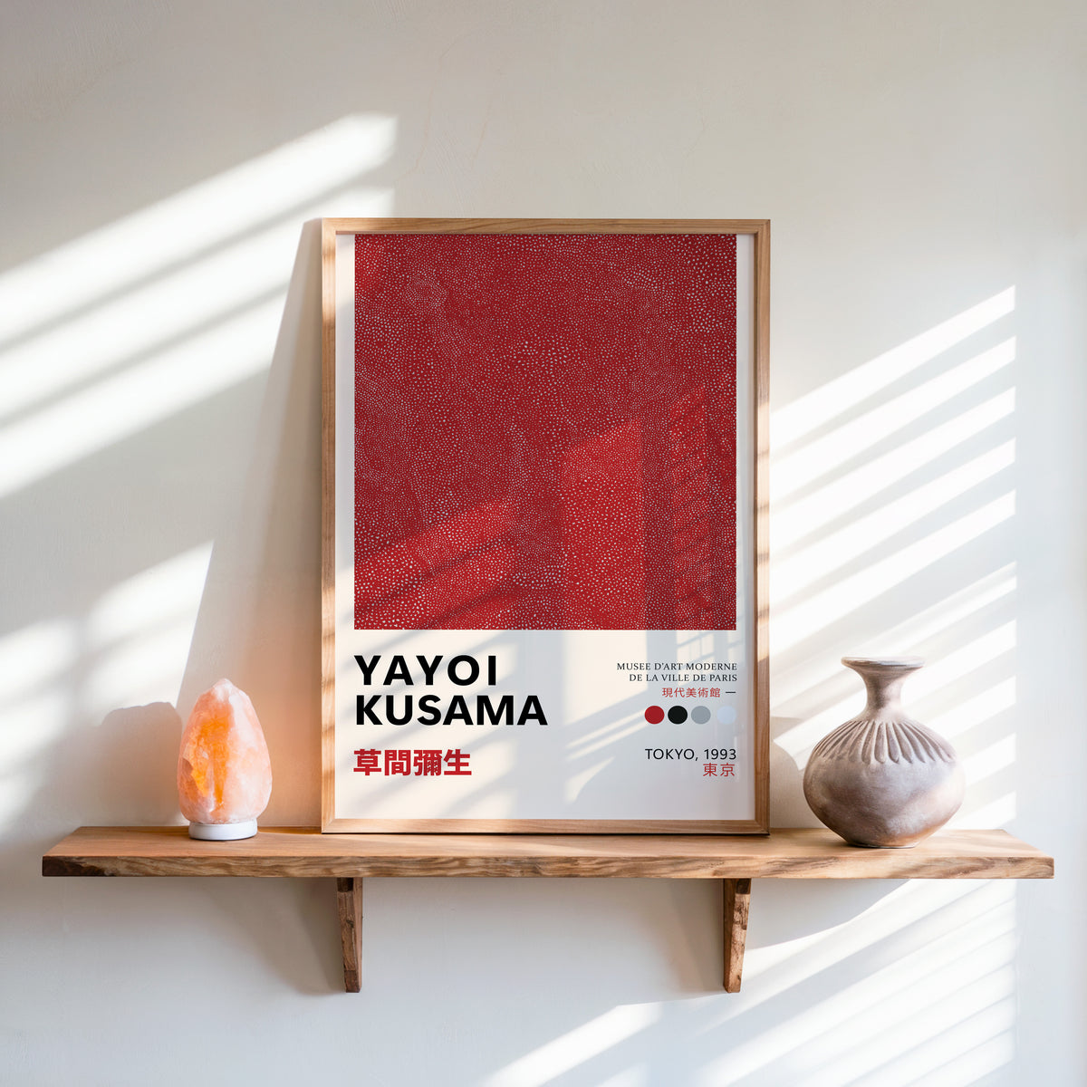 Yayoi Kusama inspired red dotted texture print above a shelf with a salt lamp