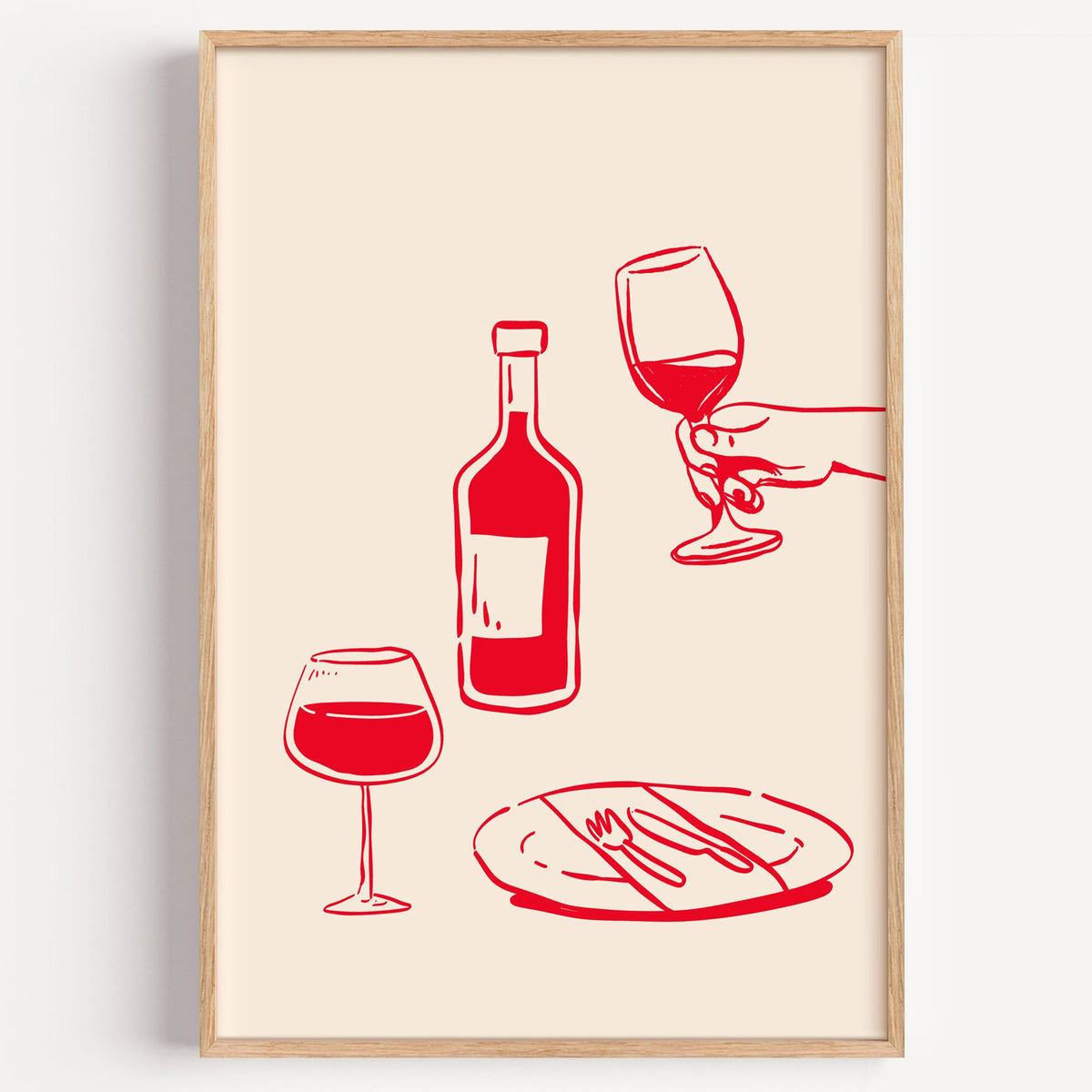 Red line wine bottle and dinner table print in a light oak frame on a plain white wall
