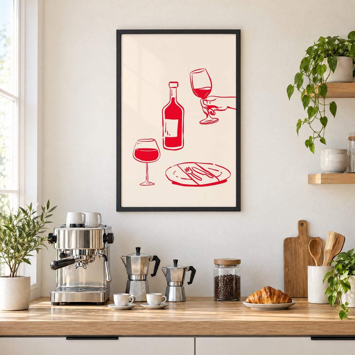 Red line wine bottle and dinner table print in a black frame above a home espresso bar with moka pots and espresso cups