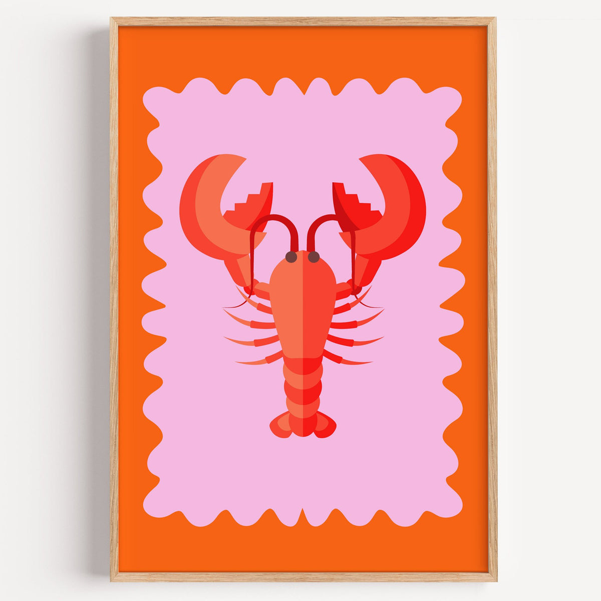 Red lobster pink wavy frame print in a light oak frame on a plain white wall