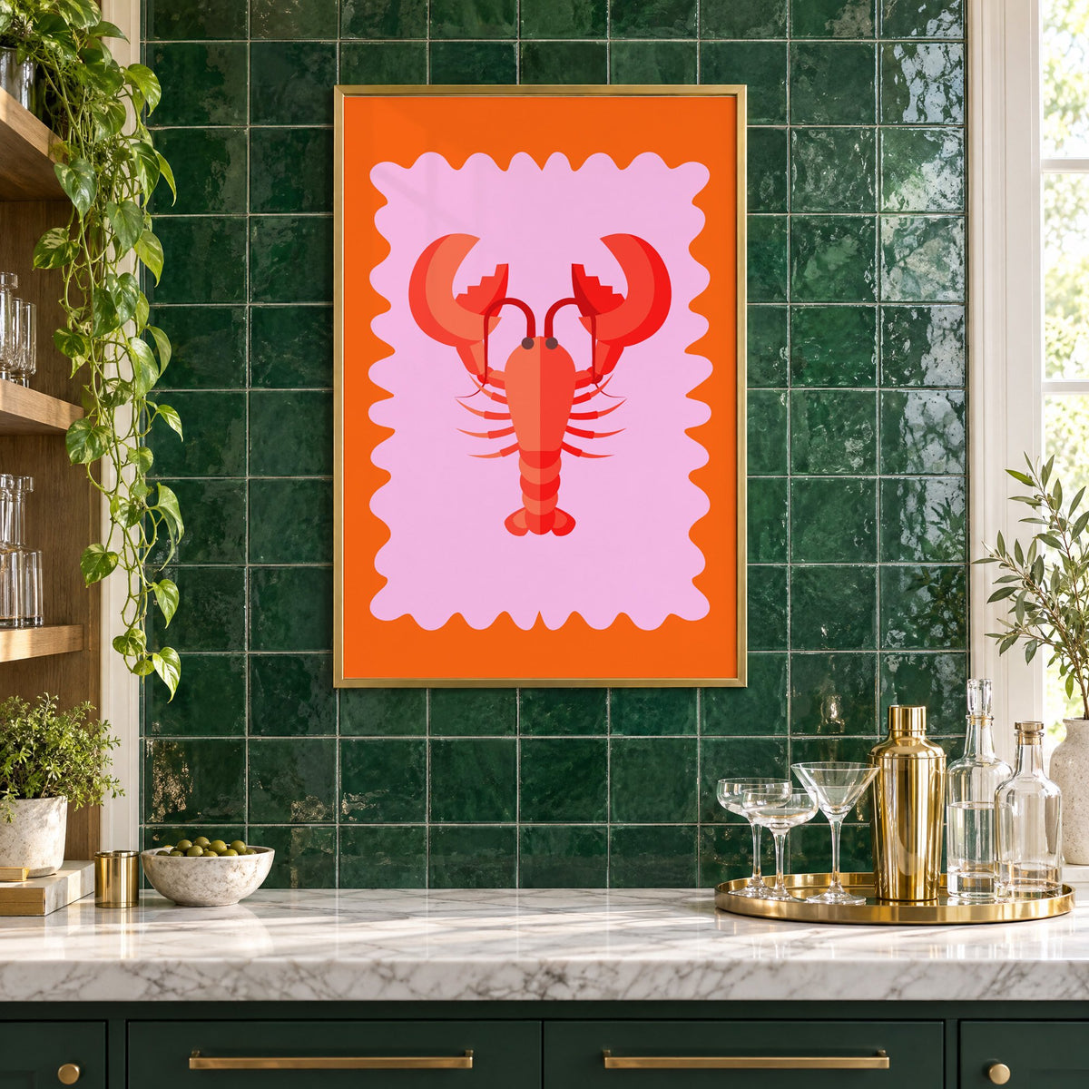 Red lobster pink wavy frame print in a brass frame on emerald green tiles above a home bar with coupe glasses