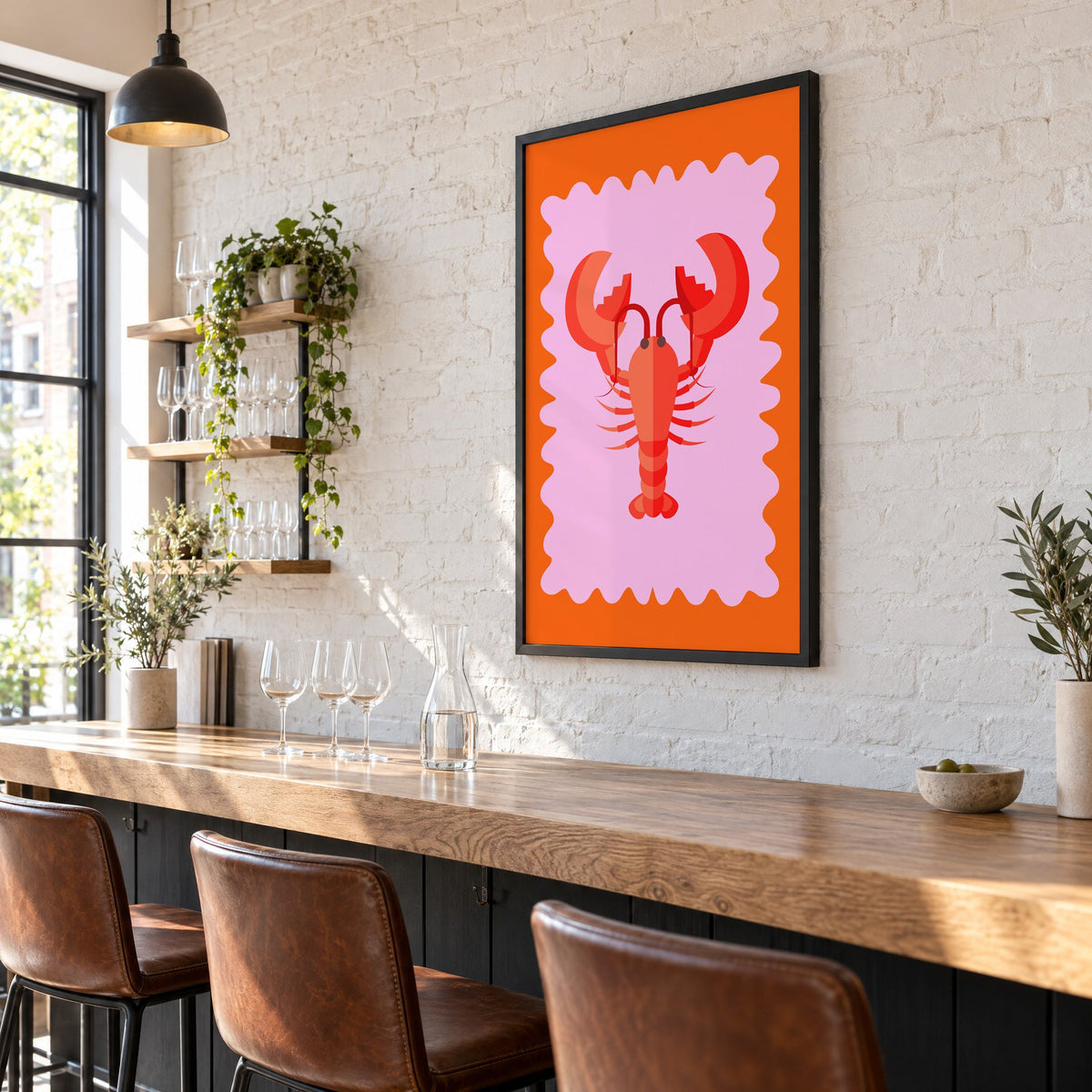 Red lobster pink wavy frame print in a black frame on a white brick wall above a wine bar counter