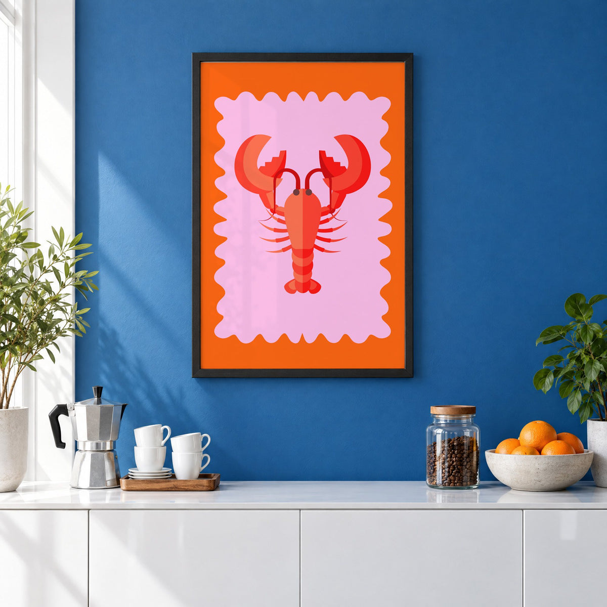 Red lobster pink wavy frame print in a black frame on a cobalt blue wall above a coffee station