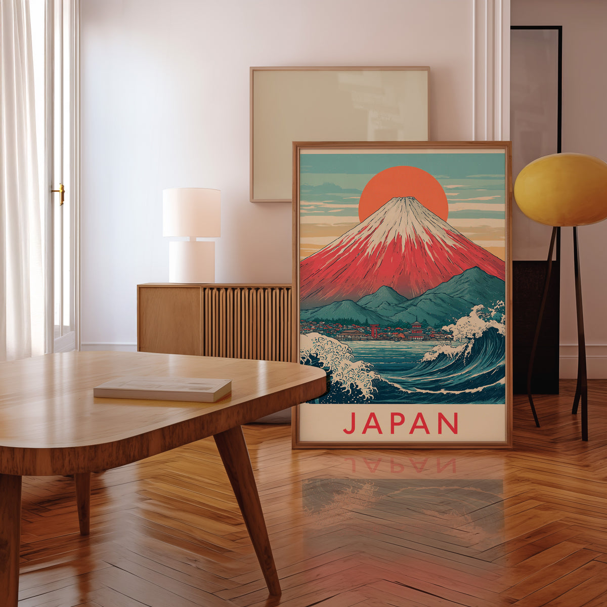 Red Mount Fuji navy wave print in a walnut frame leaning in a mid-century living room