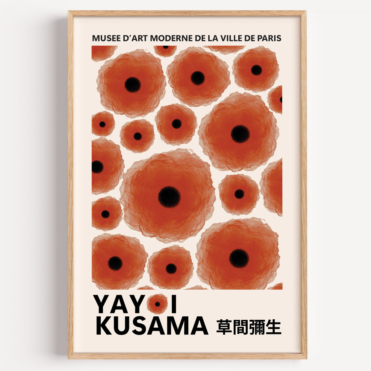 Yayoi Kusama inspired red poppy dot print in a wood frame on a plain wall