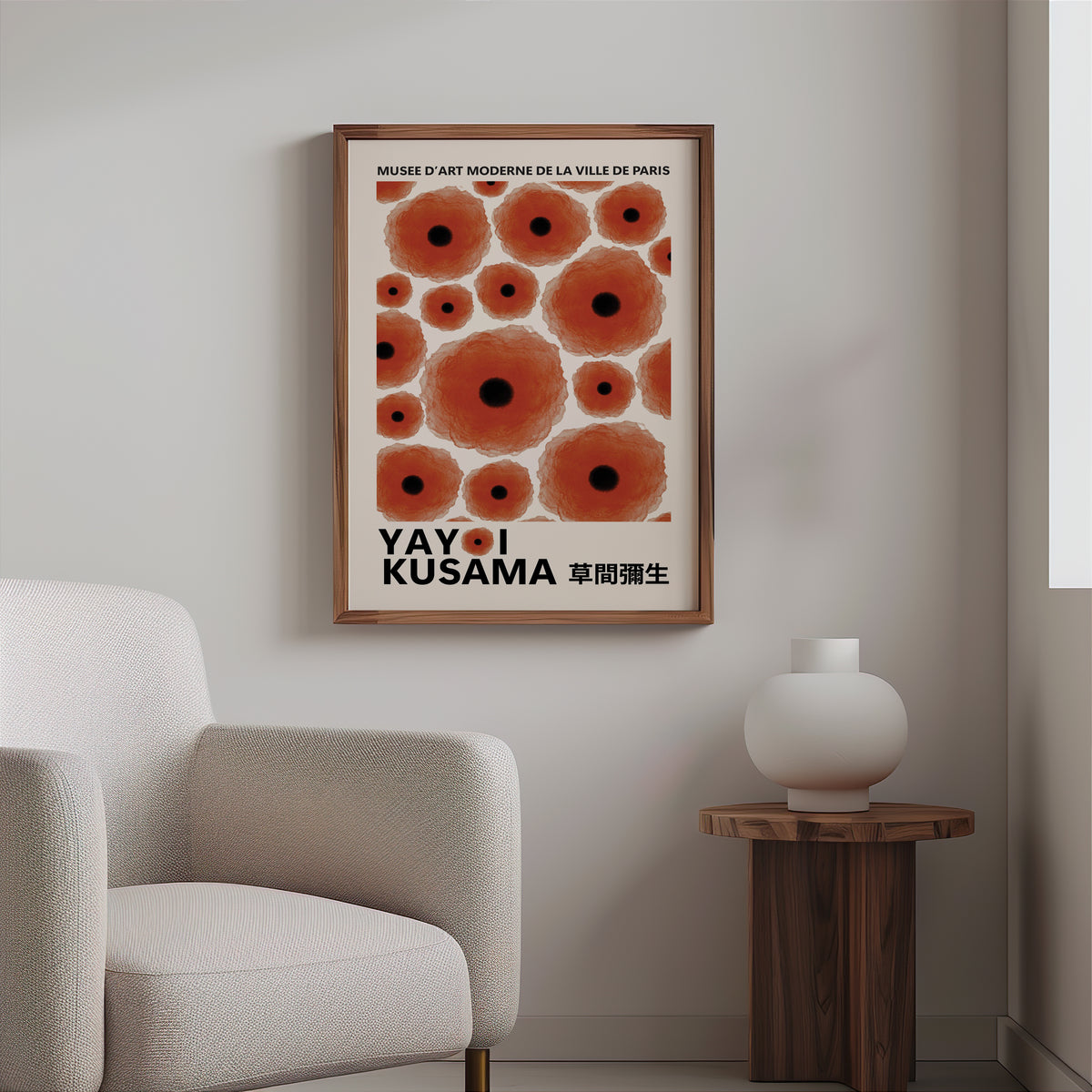 Yayoi Kusama inspired red poppy dot print above a cream boucle armchair