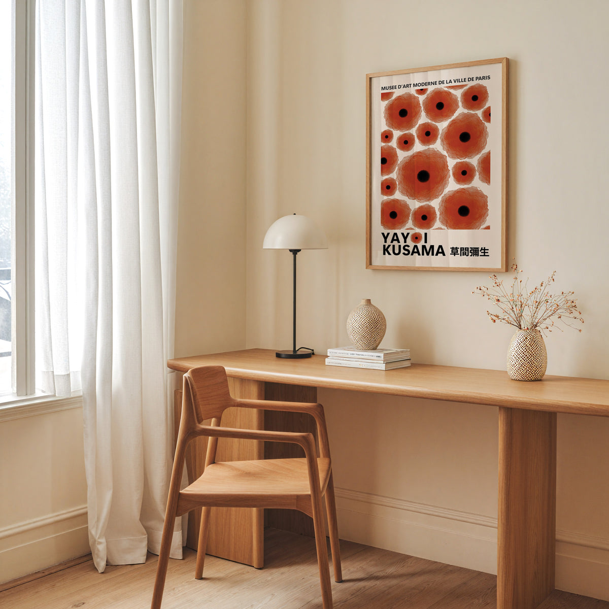 Yayoi Kusama inspired red poppy dot print above a desk with a dome lamp