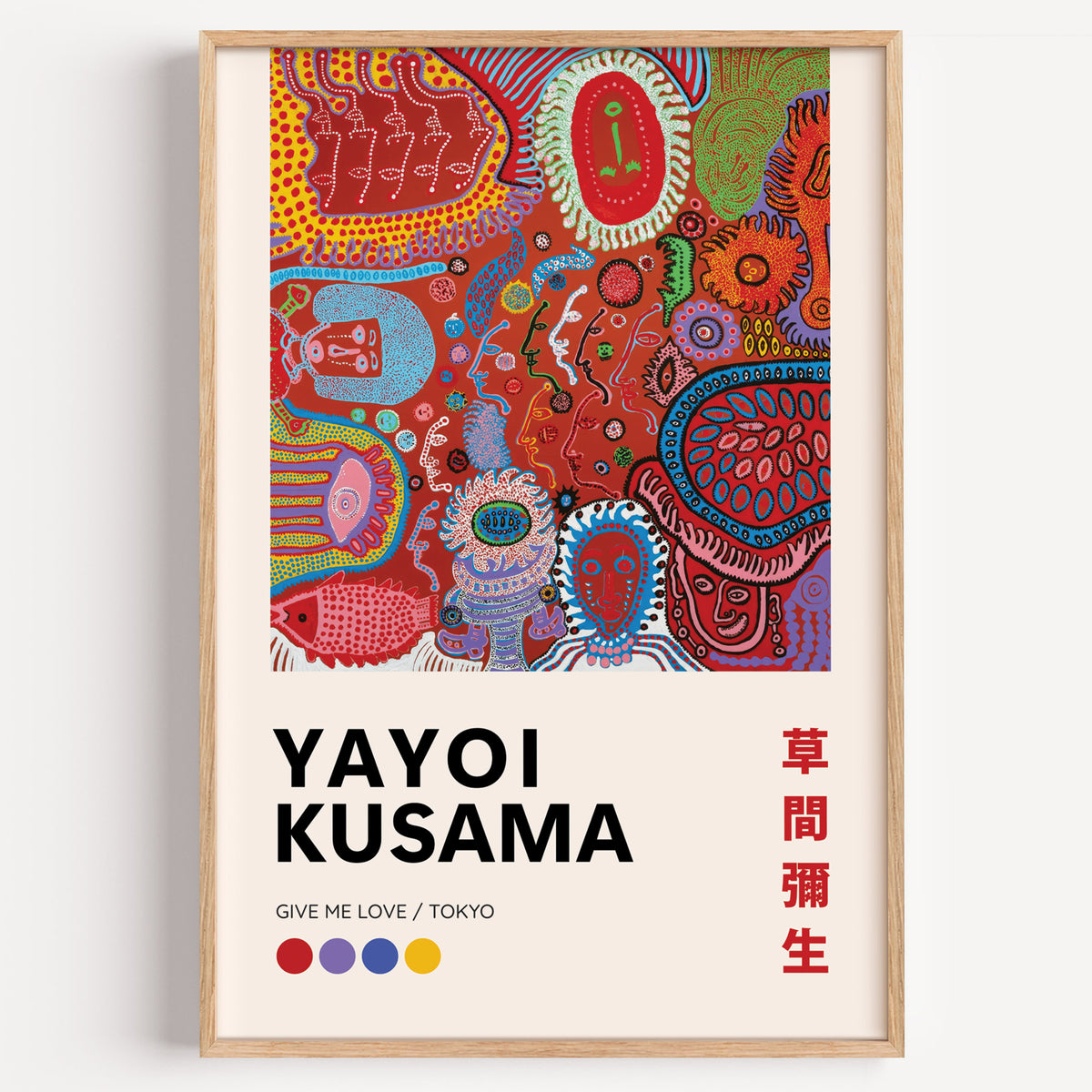 Yayoi Kusama inspired red psychedelic faces print in a wood frame on a plain wall