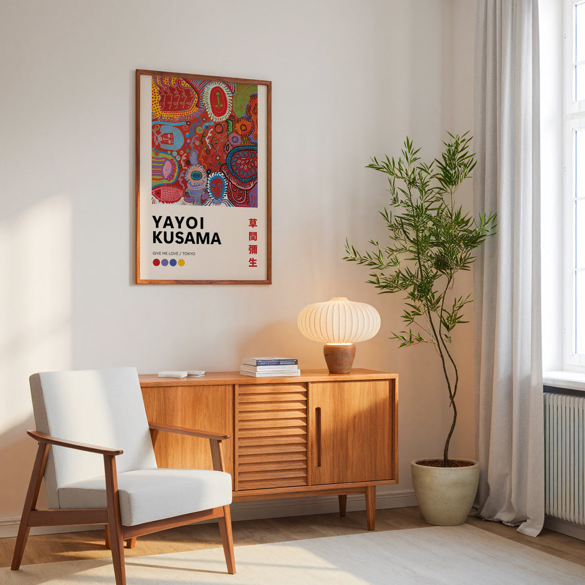 Yayoi Kusama inspired red psychedelic faces print above a mid-century sideboard