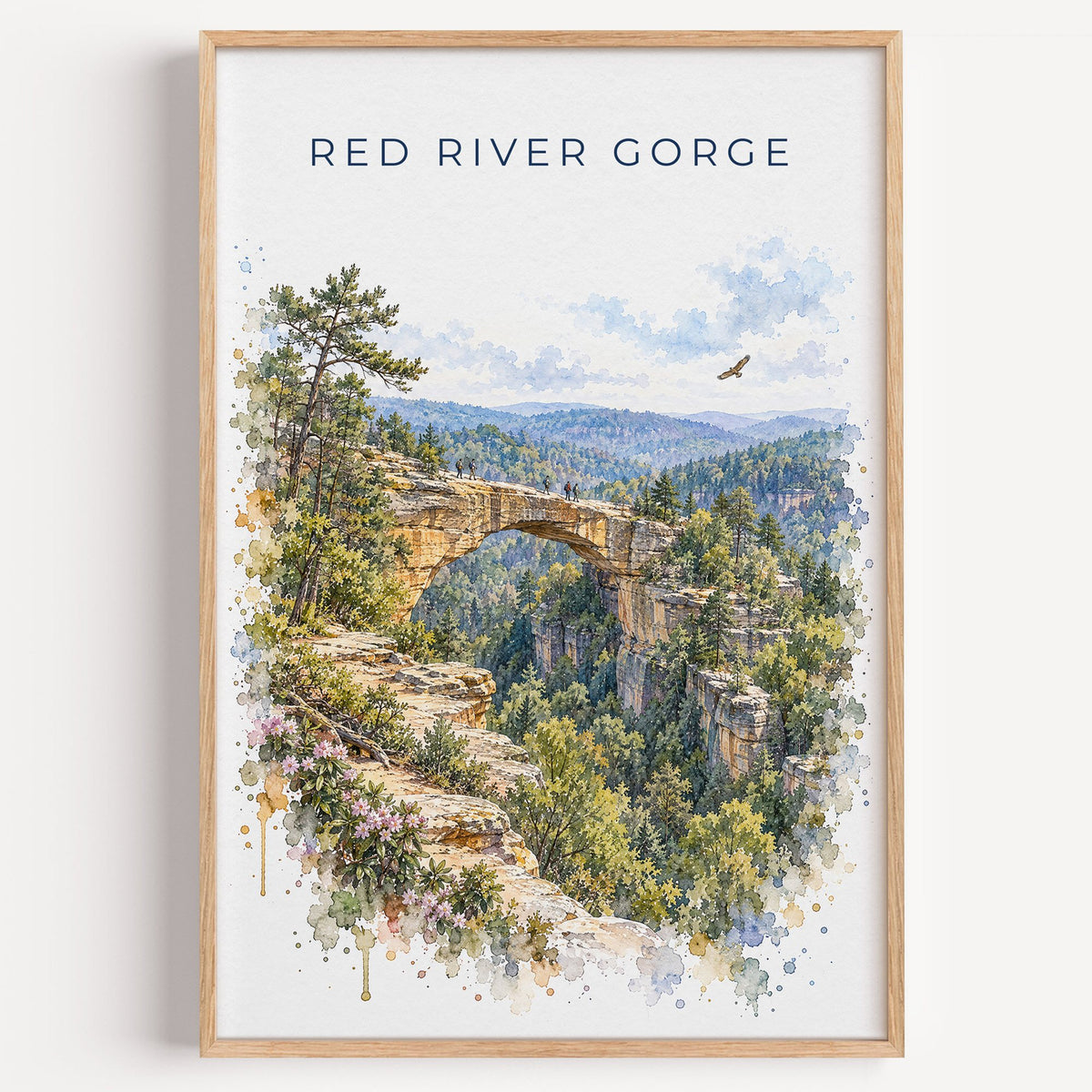 Red River Gorge watercolor print in a light oak frame on a plain white wall