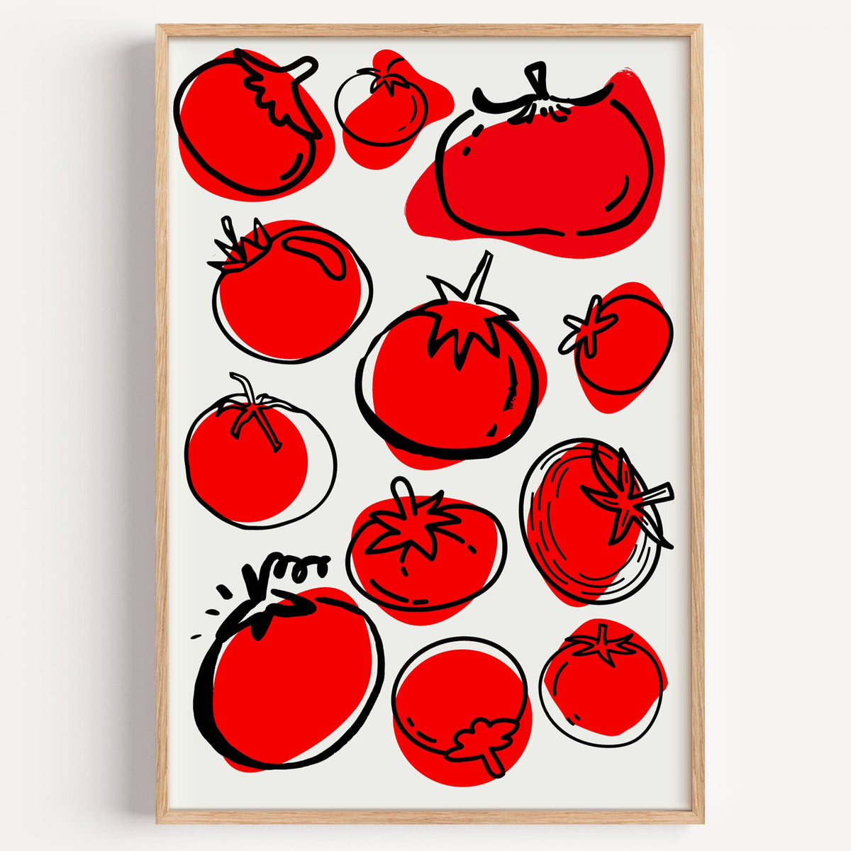 Red tomatoes offset line pattern print in a light oak frame on a plain white wall