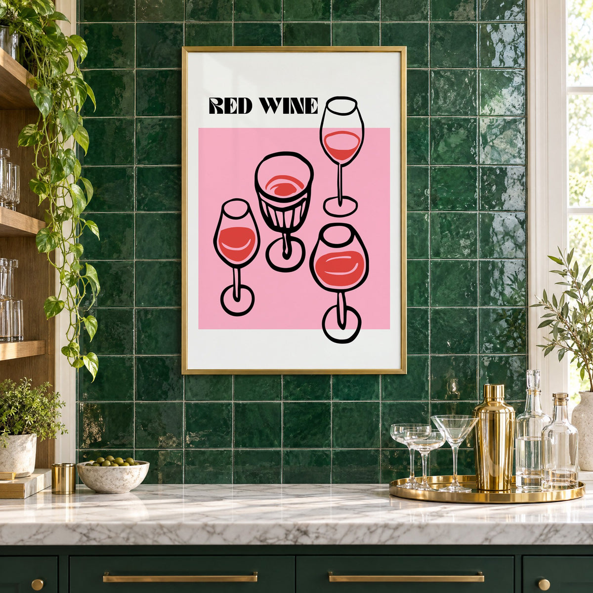 RED WINE four glasses pink print in a brass frame on emerald green tiles above a home bar with coupe glasses