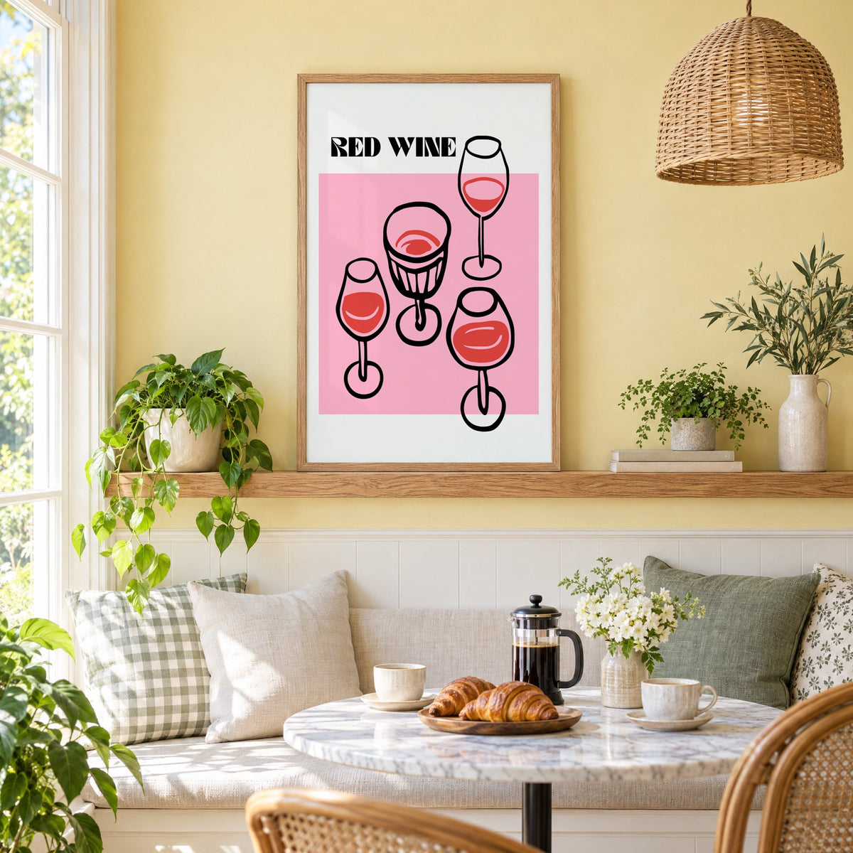 RED WINE four glasses pink print in an oak frame on a picture ledge above a sunny breakfast nook