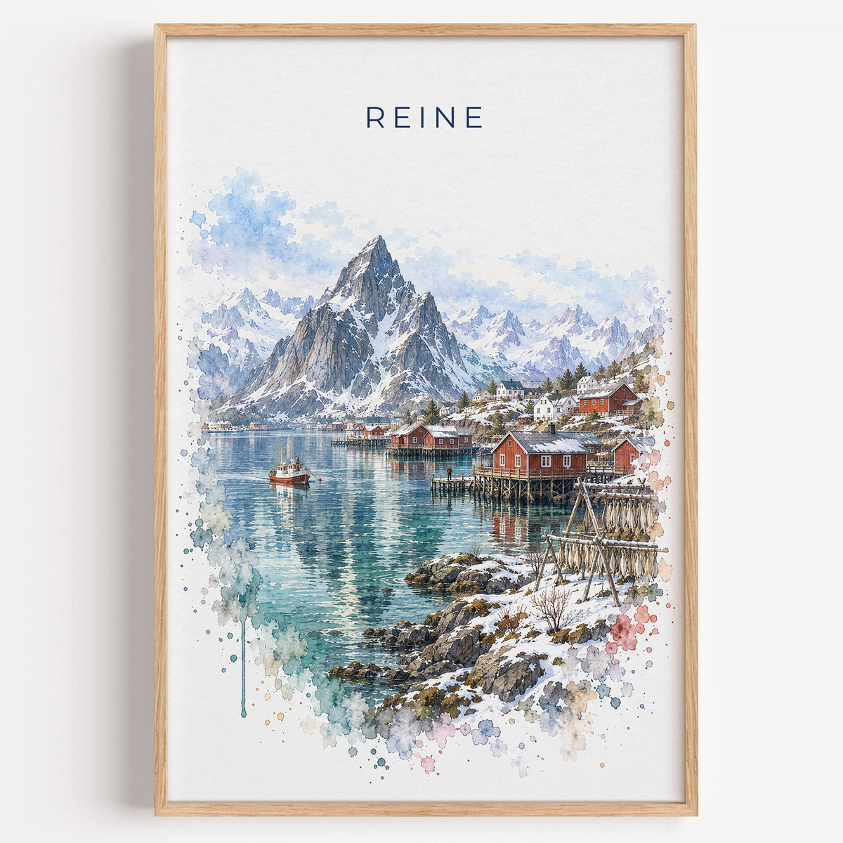 Reine, Norway watercolor print in a light oak frame on a plain white wall