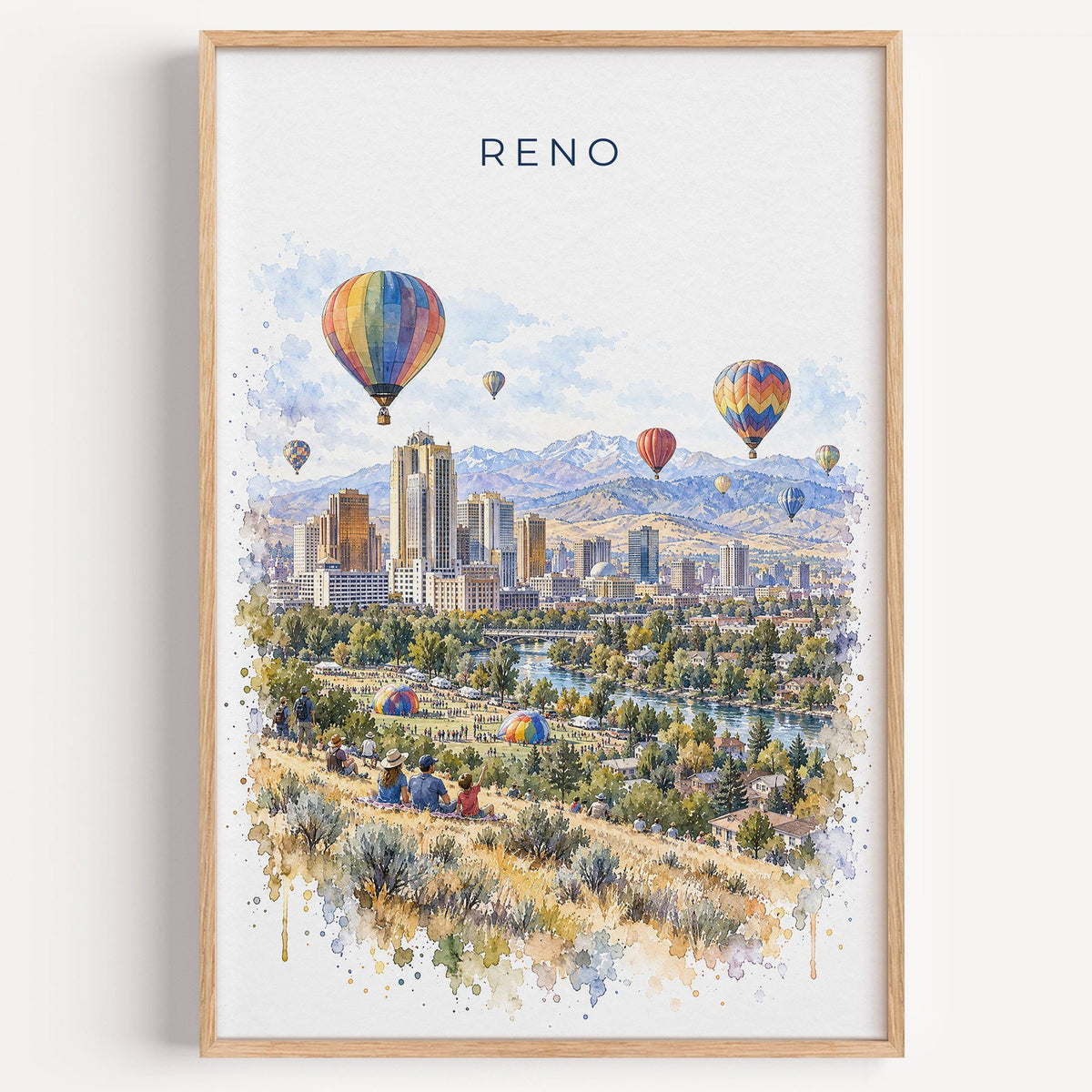 Reno, Nevada watercolor print in a light oak frame on a plain white wall
