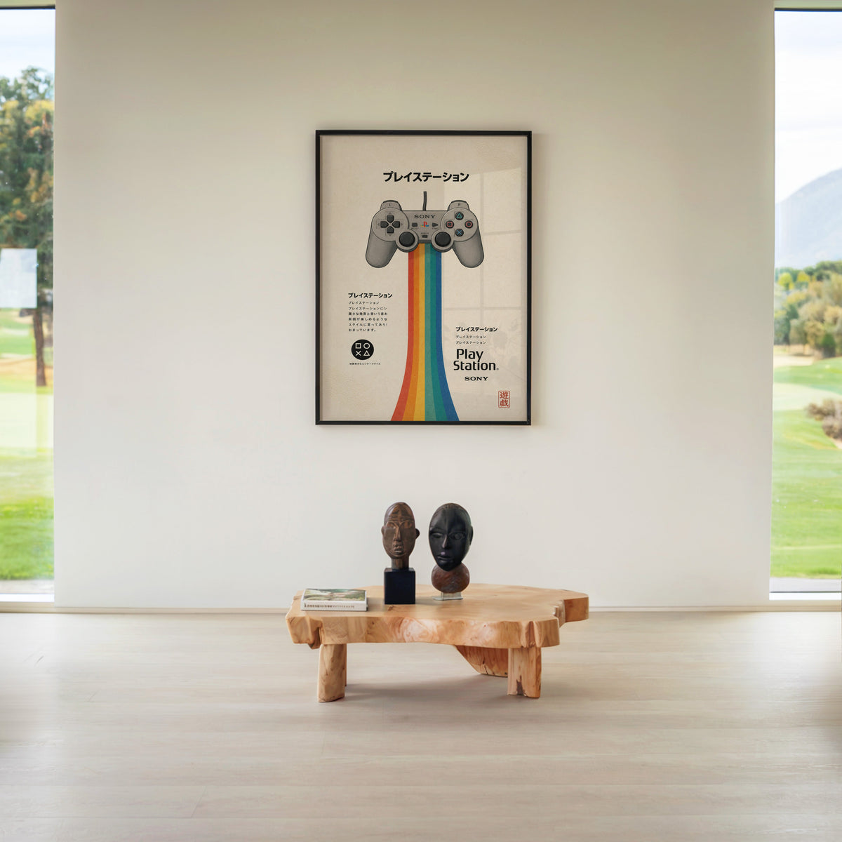 retro game controller with rainbow print in a black frame above a live-edge wood coffee table between garden windows