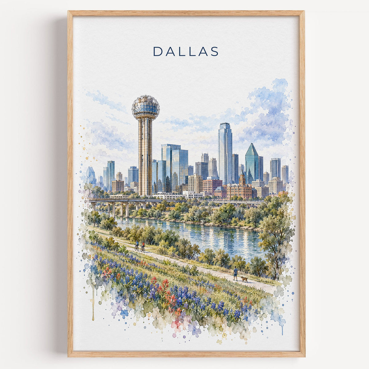 Reunion Tower Dallas watercolor print in a light oak frame on a plain white wall