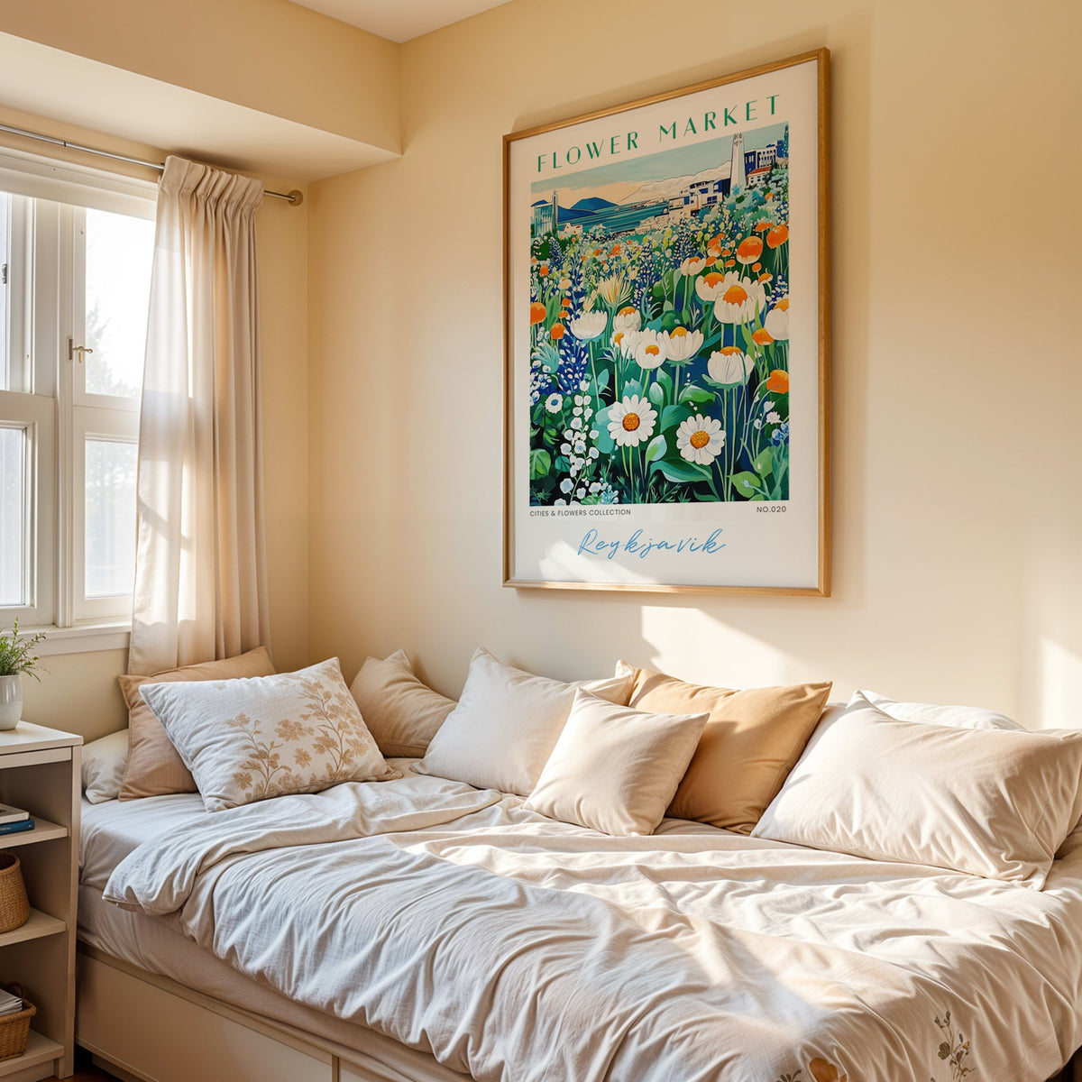Reykjavik flower market print in an oak frame above a cream daybed in a sunny bedroom