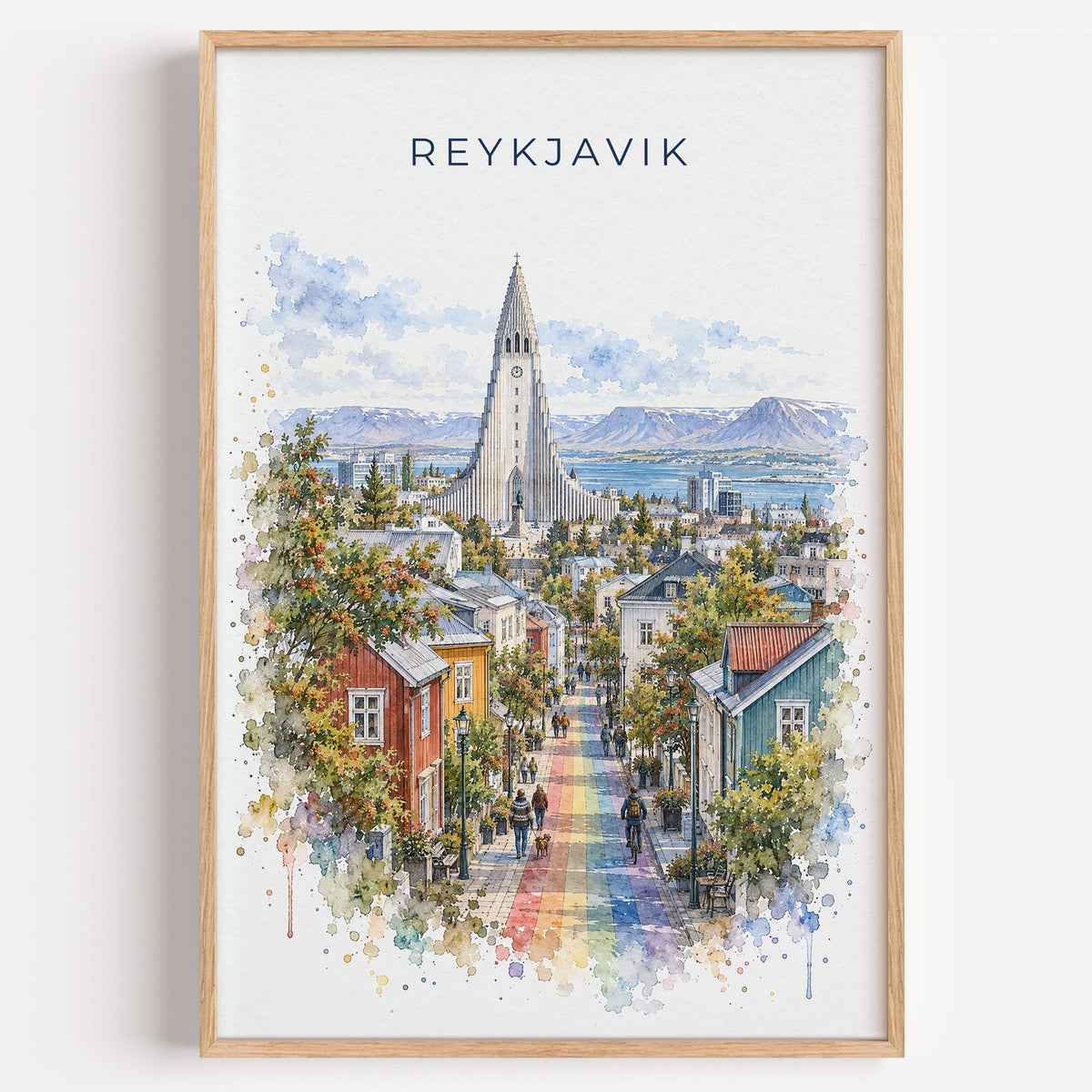 Reykjavik watercolor print in a light oak frame on a plain white wall