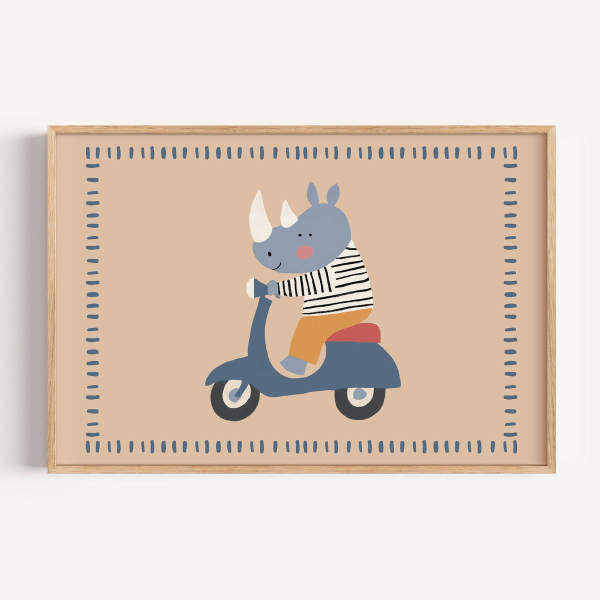 Landscape rhino on a blue scooter nursery print in a light oak frame on a plain white wall