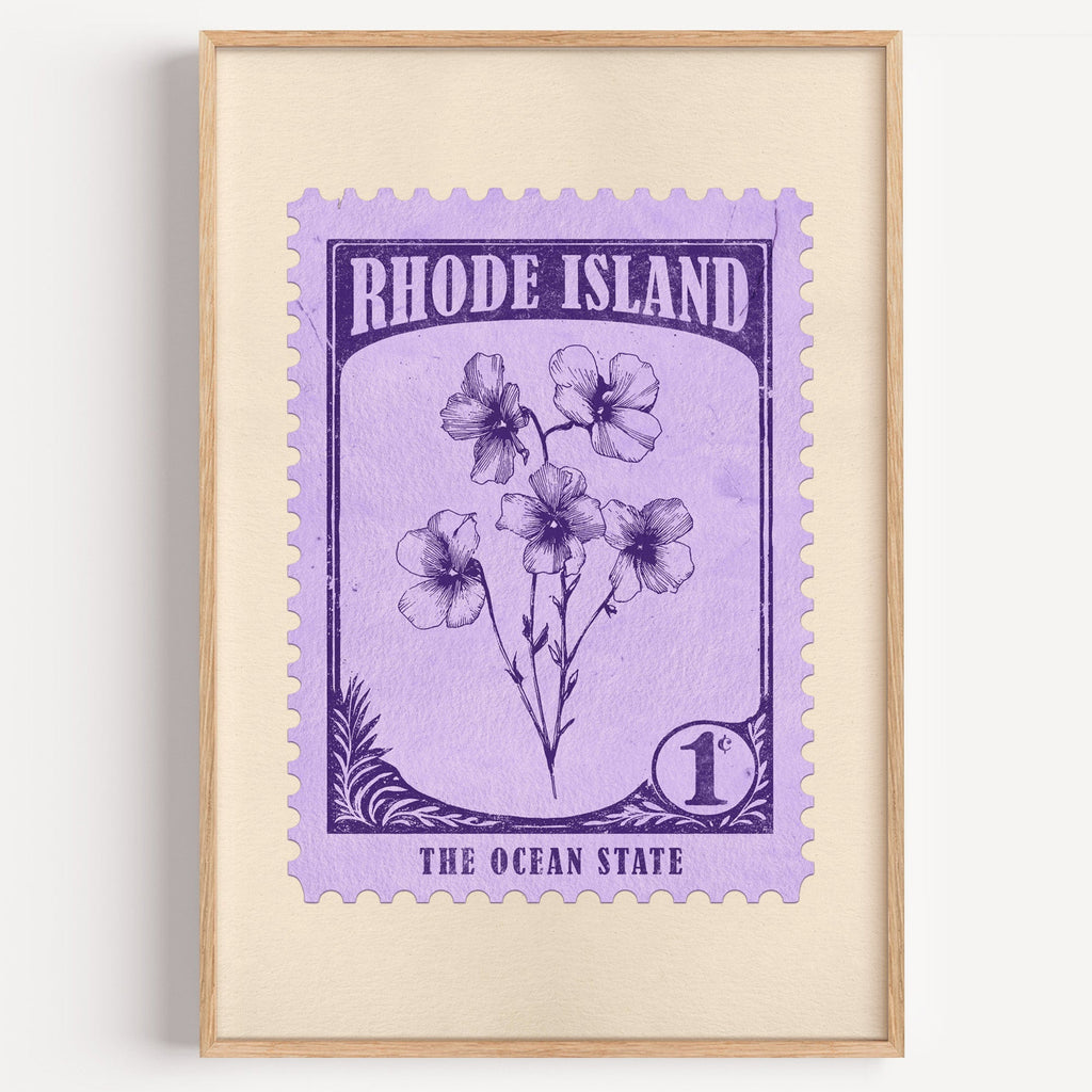 Rhode Island state flower stamp print in violet on lavender, light oak frame on a plain white wall