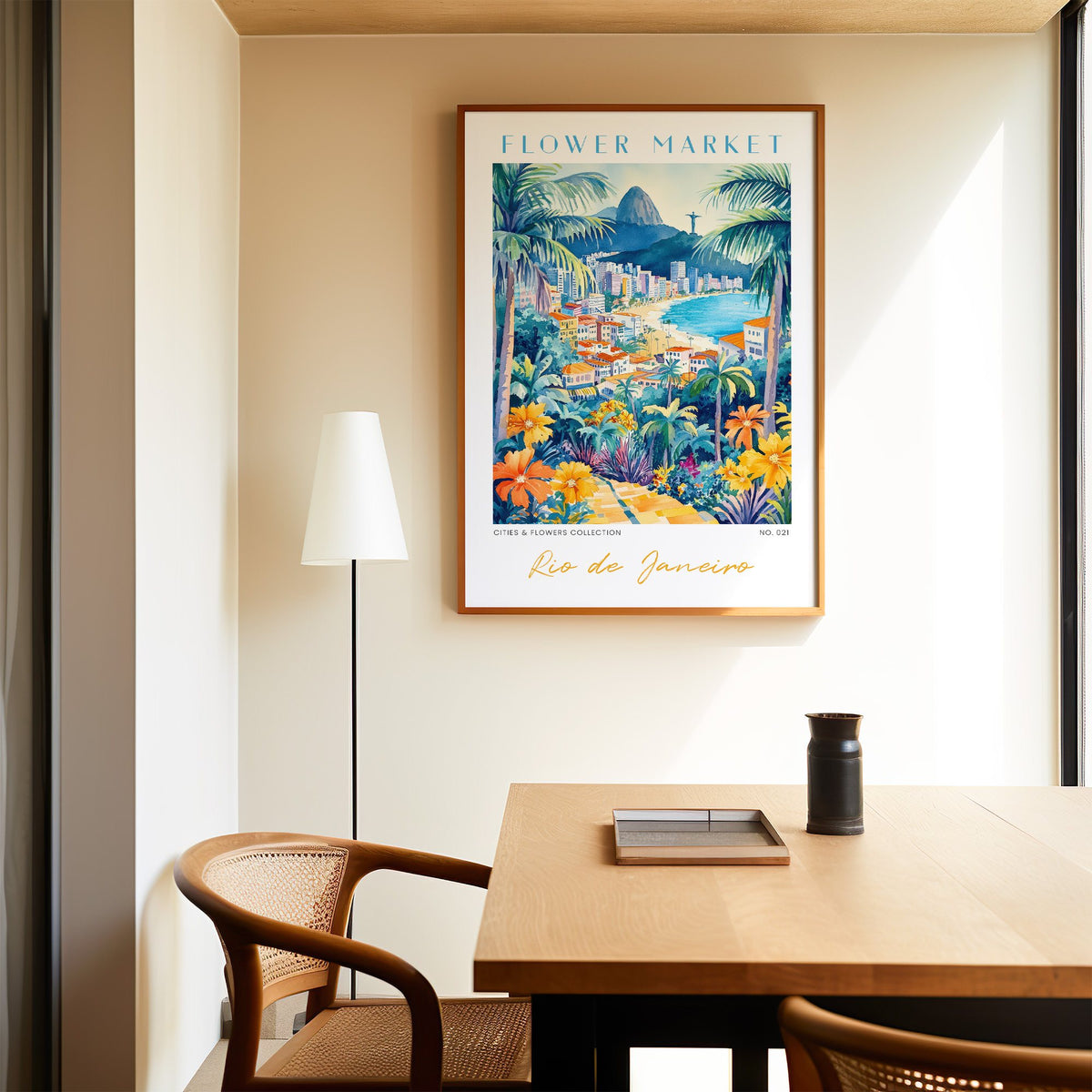 Rio de Janeiro flower market print in an oak frame above a dining table and cane chair