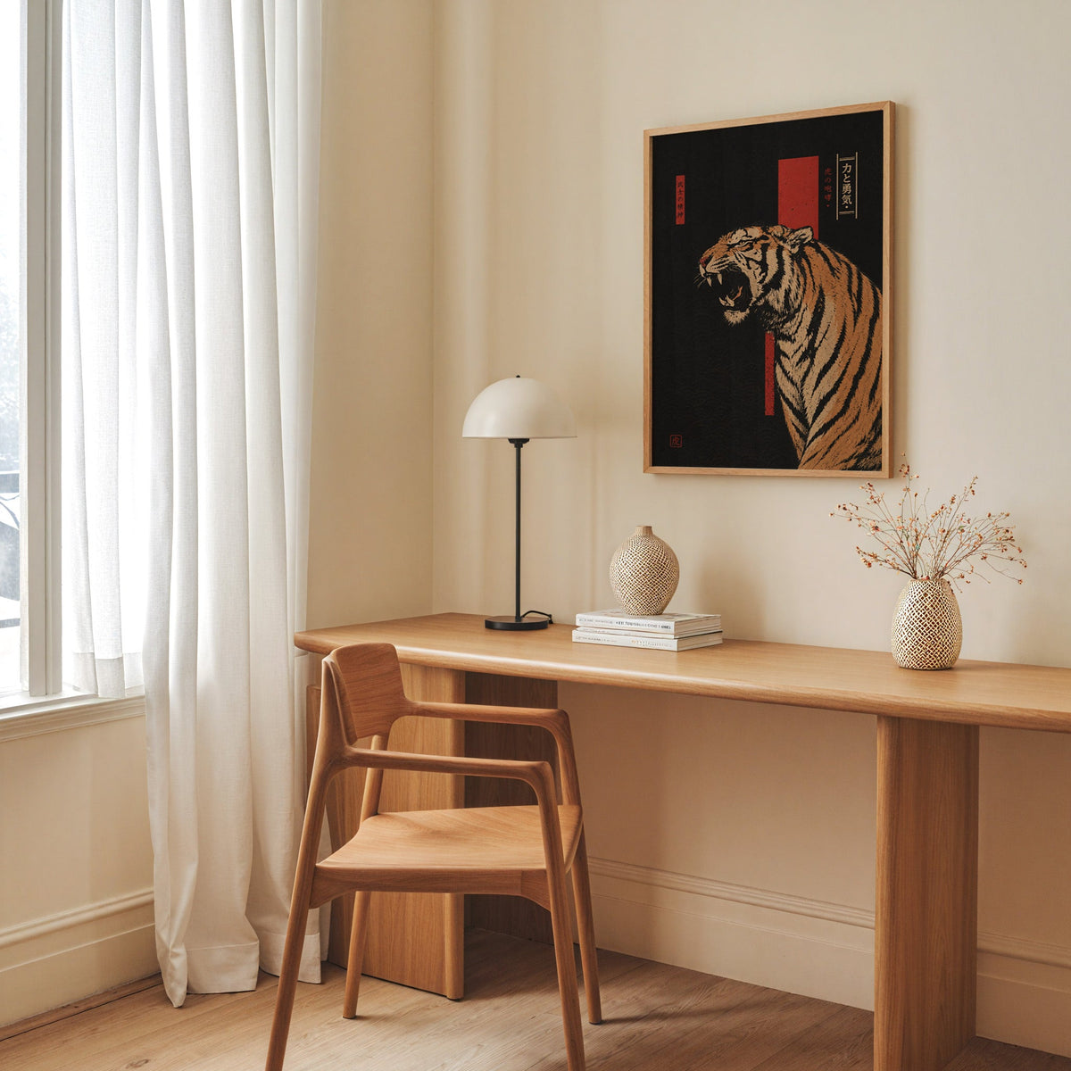 roaring tiger on black with red banner print in an oak frame above a long oak desk with a white dome lamp and woven vases