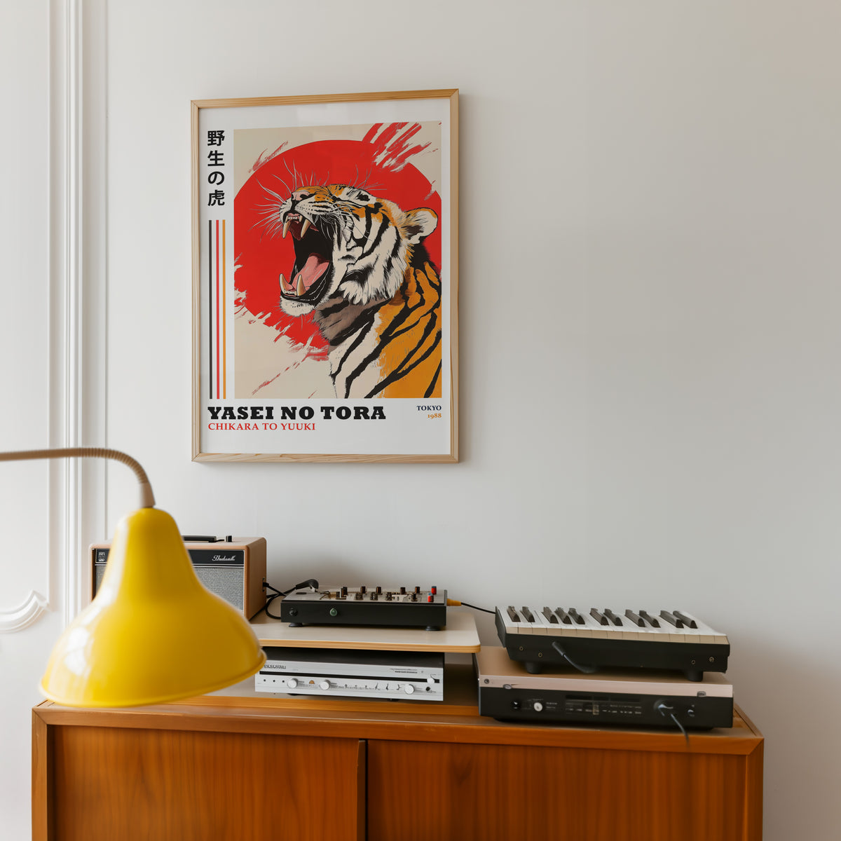 Roaring tiger with red sun print in an oak frame above a teak sideboard with vintage hi-fi