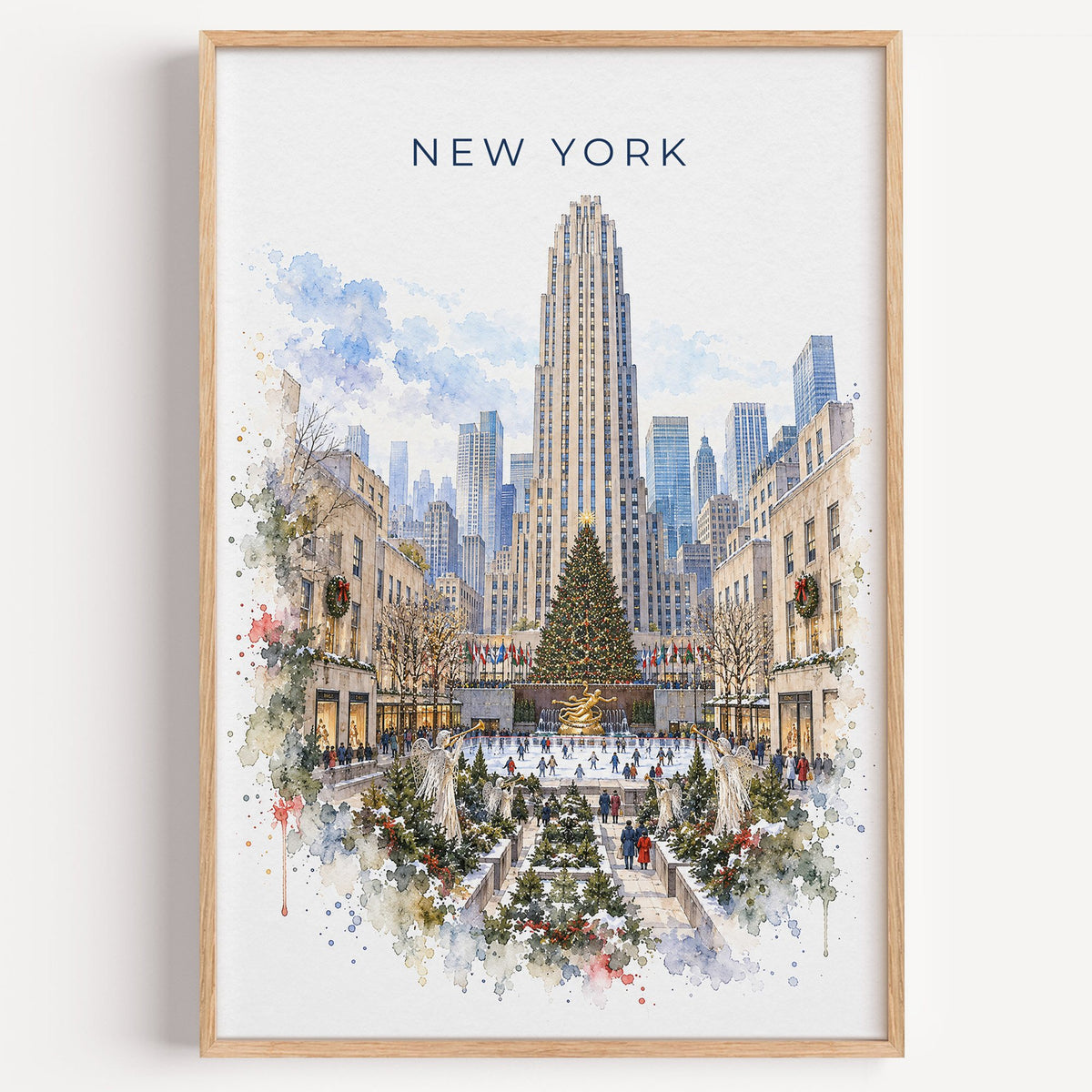 Rockefeller Center watercolor print in a light oak frame on a plain white wall