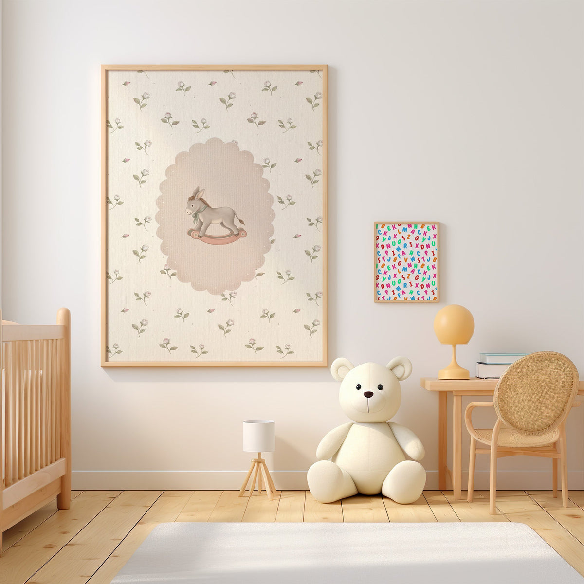 Rocking donkey toy on rosebud wallpaper nursery print in an oak frame above a wooden crib beside a cream teddy bear